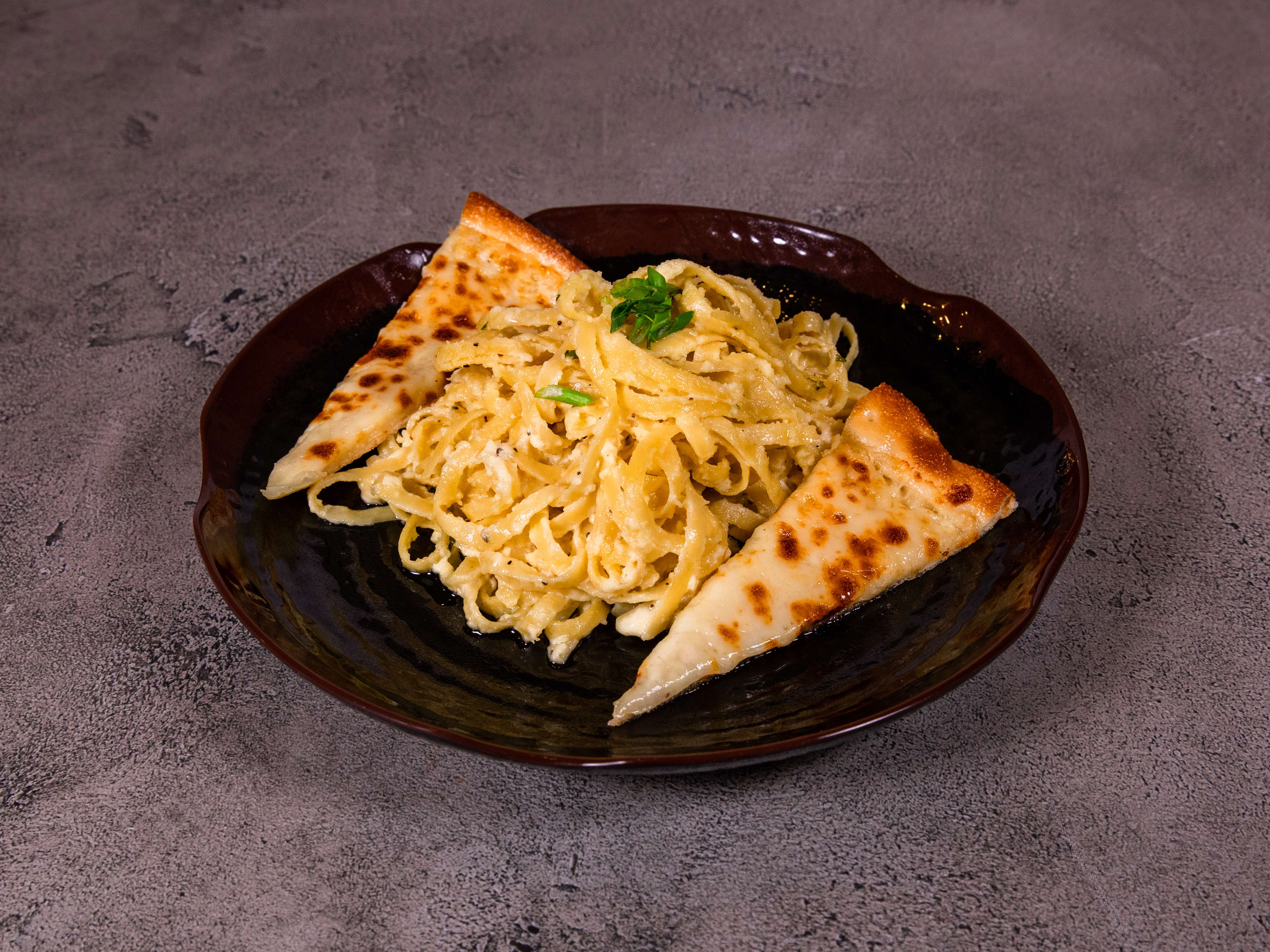 Order Fettuccini Alfredo food online from Fresco Cafe store, New Orleans on bringmethat.com