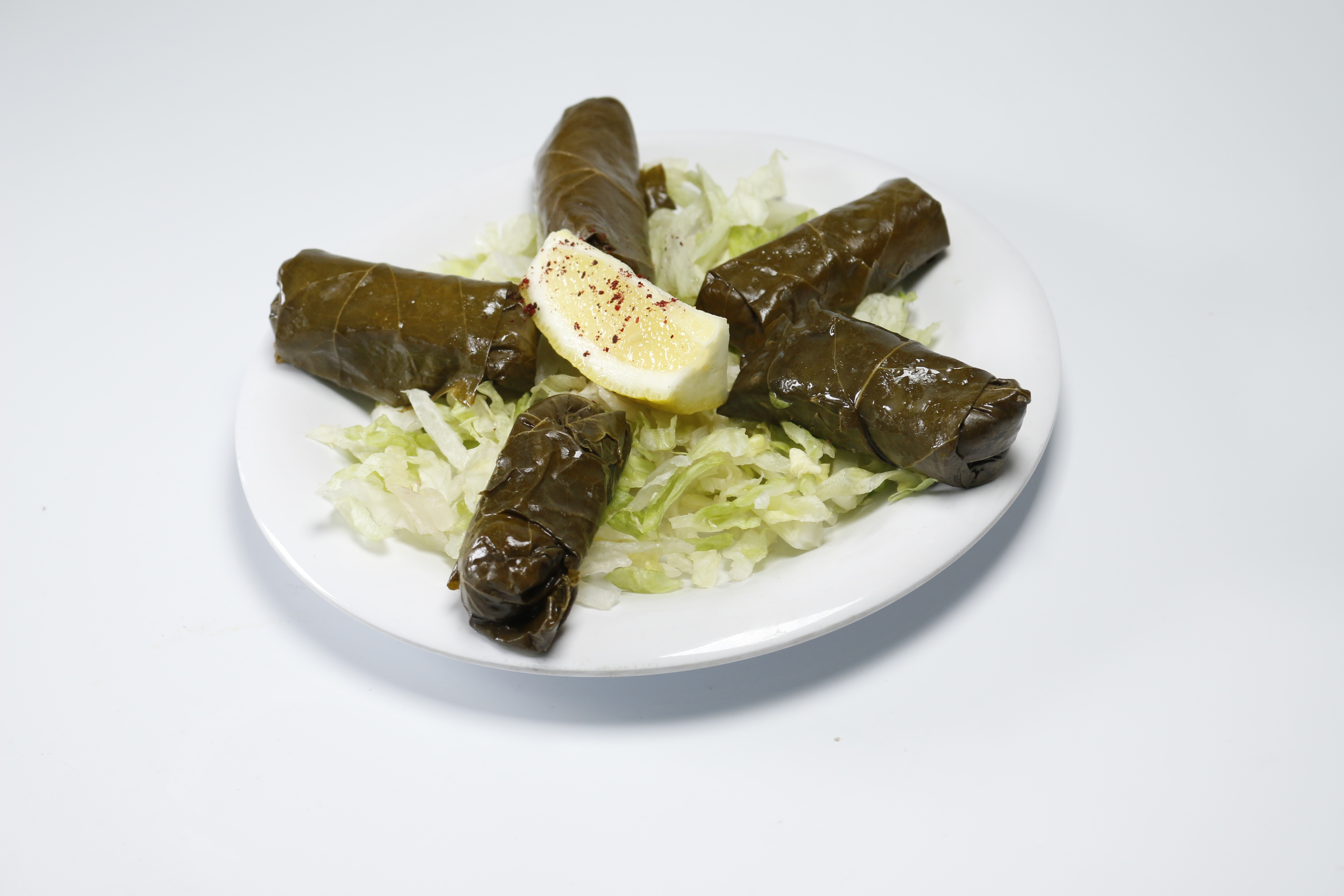 Order Dolmathes (5 pc.) (Vegan) food online from Wing Pop By Gyro Express store, San Francisco on bringmethat.com