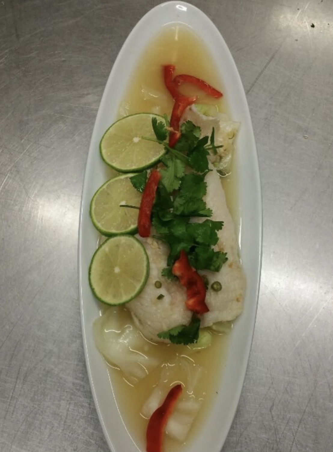 Order SE3. Lemon Fish food online from Thai Quality Restaurant store, Oxnard on bringmethat.com