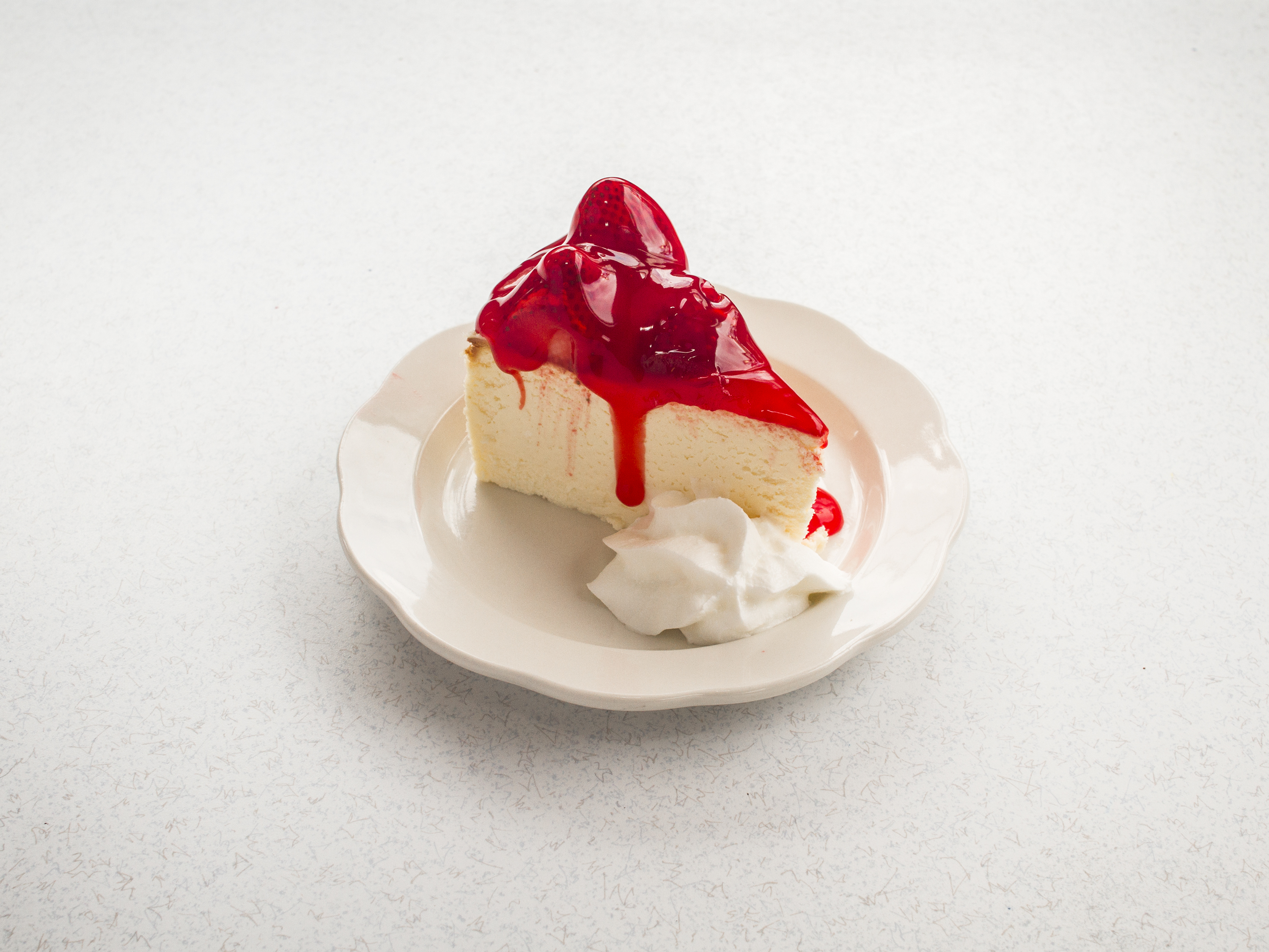 Order Strawberry Cheesecake food online from Four Star Diner store, Union City on bringmethat.com