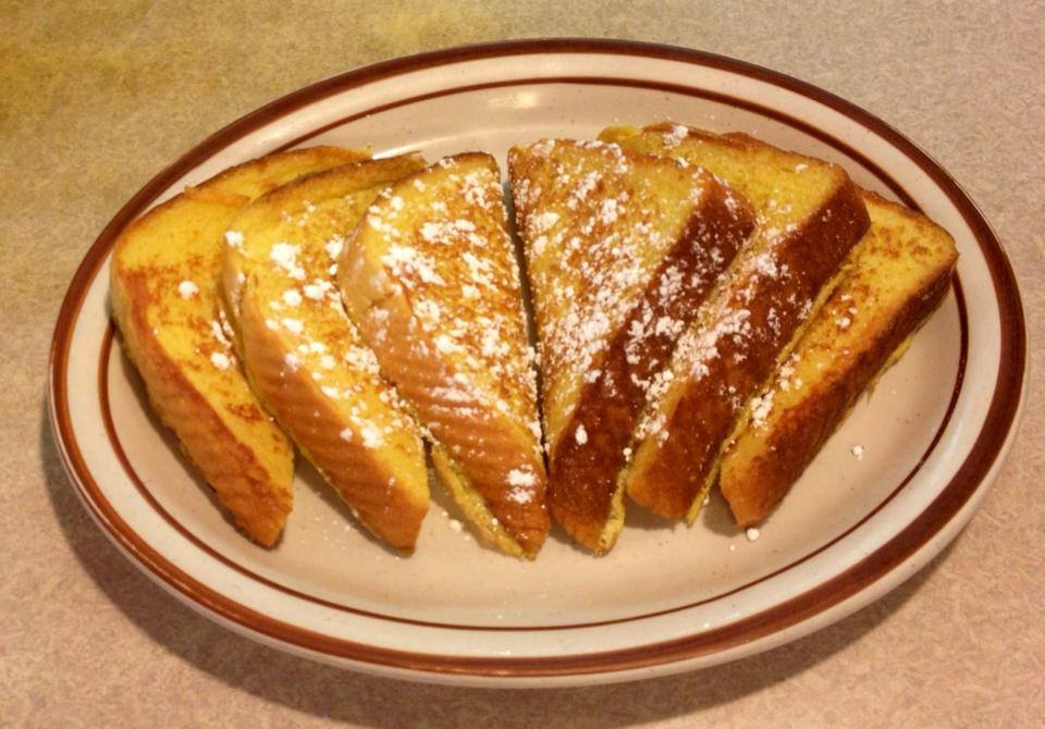 Order 3 French Toast Wedges food online from New Day Cafe store, Terre Haute on bringmethat.com