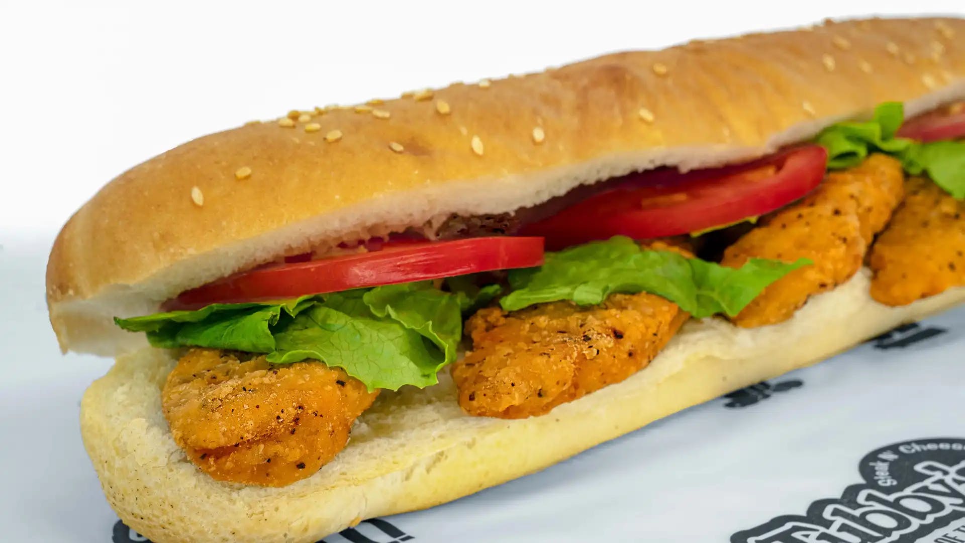 Order Crispy Chicken Sub - Small food online from Tubby's Grilled Submarines store, Westland on bringmethat.com