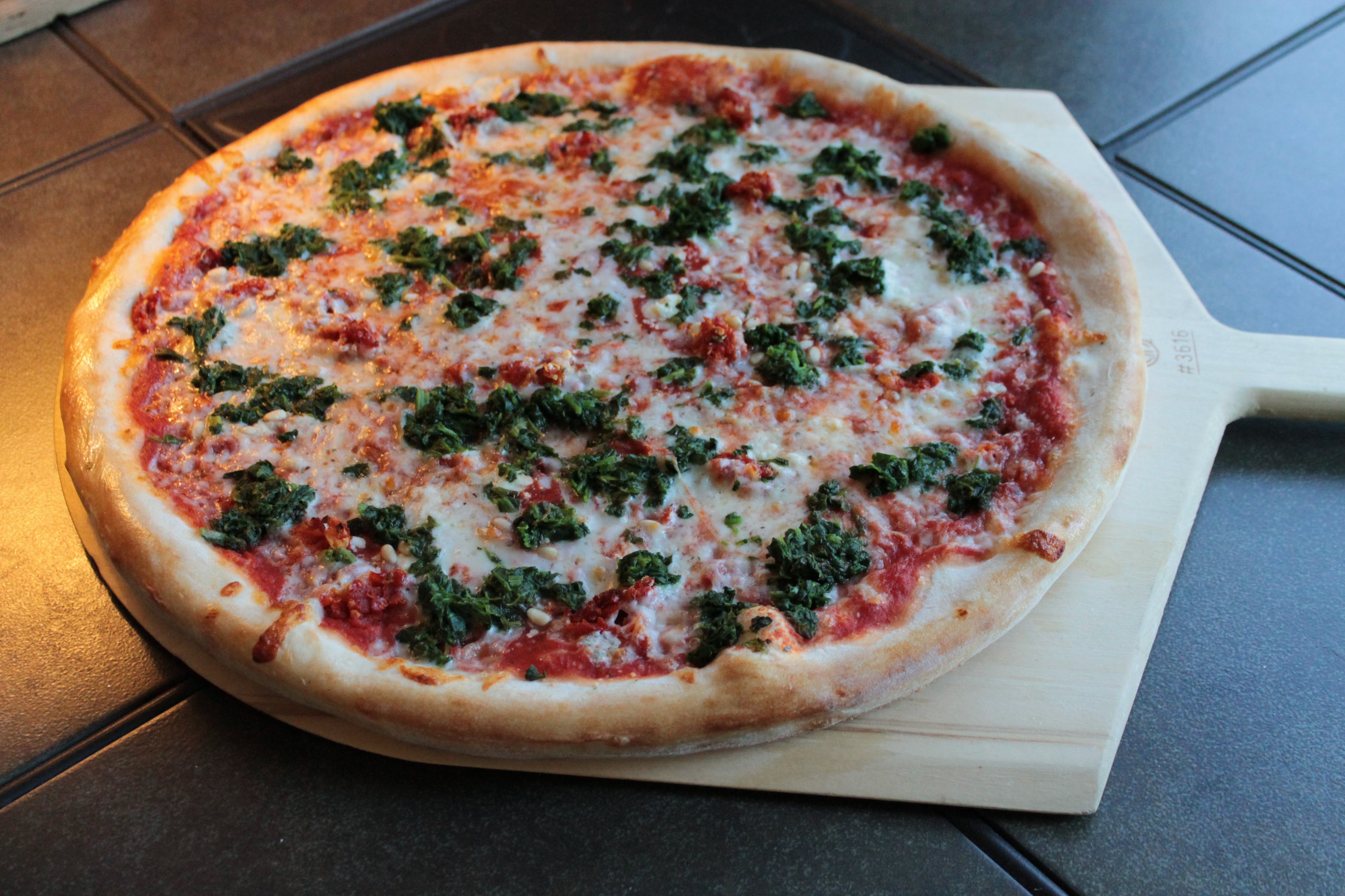Order Spinaccie Pizza - Medium 14" food online from The Dough Boy's Pizzeria store, Baldwinsville on bringmethat.com