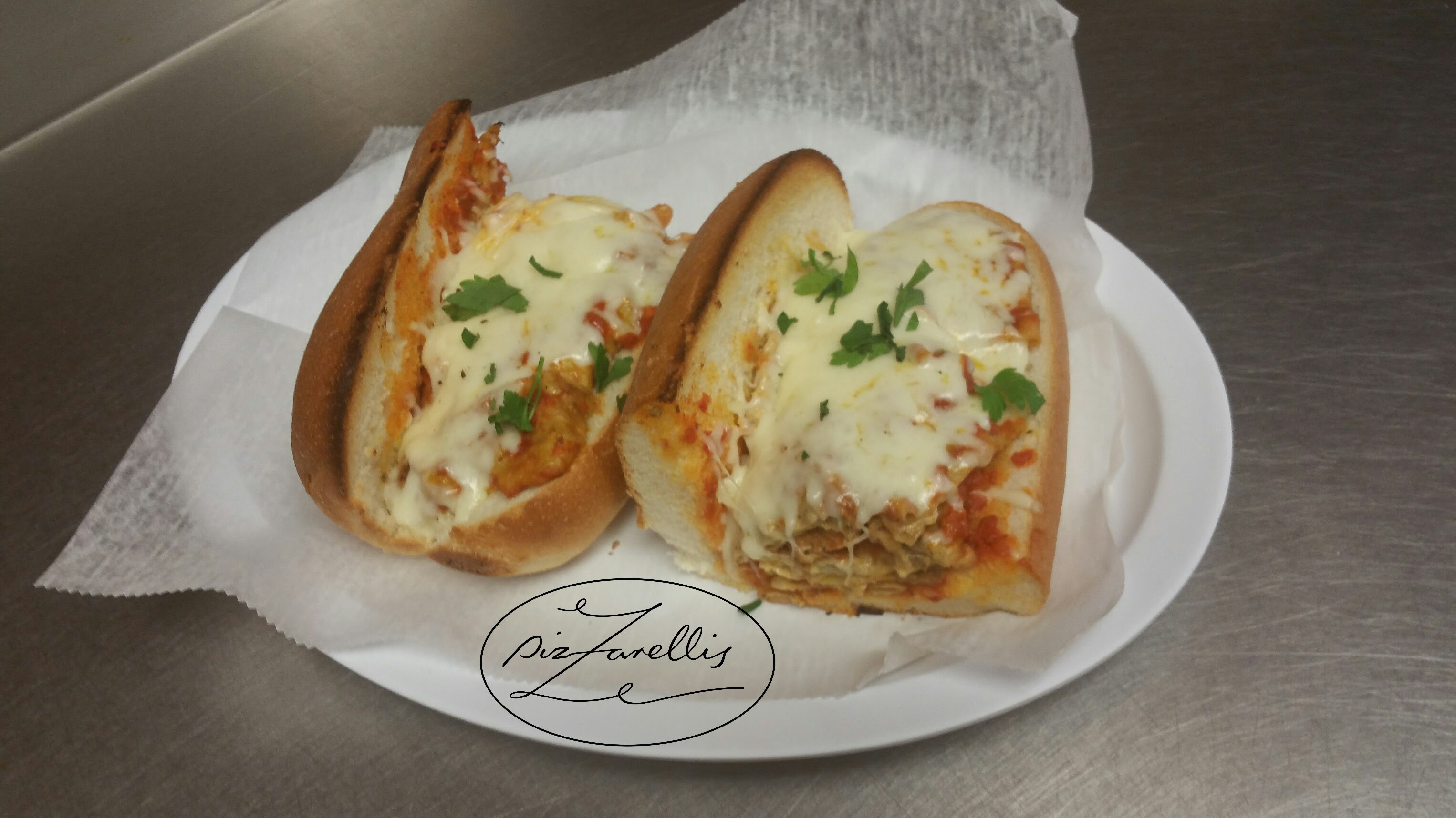 Order Eggplant Parmigiana Hot Hero food online from Pizzarelli's Pizza store, Scarsdale on bringmethat.com