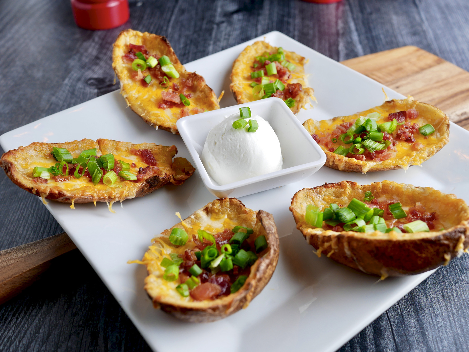 Order Loaded Potato Skins food online from Kocky Bar & Grill store, Fresno on bringmethat.com