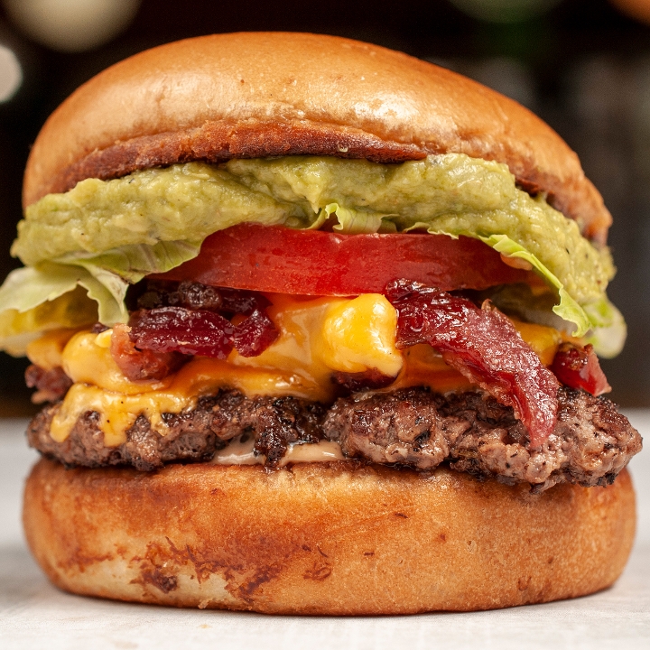 Order Bacon-Guacamole Burger food online from Big Al Burgers & Dogs store, Fort Collins on bringmethat.com