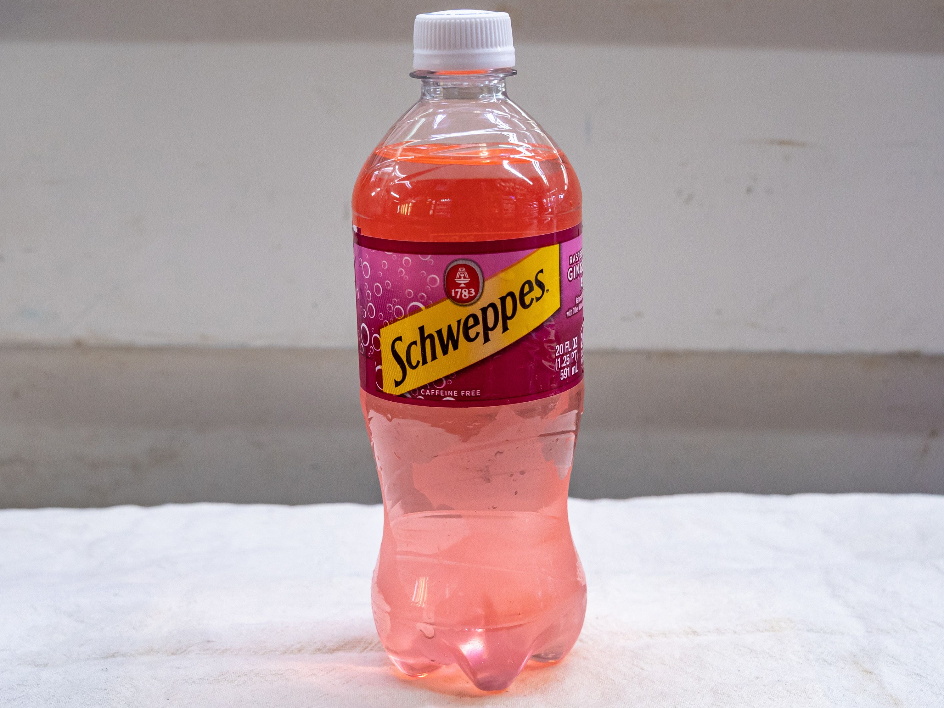 Order Schweppes Raspberry Ginger Ale -20oz bottle food online from Quentin Deli and Grocery store, Brooklyn on bringmethat.com