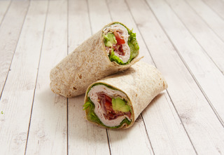 Order Turkey BLTA Wrap food online from Green Leaf's and Bananas store, Concord on bringmethat.com