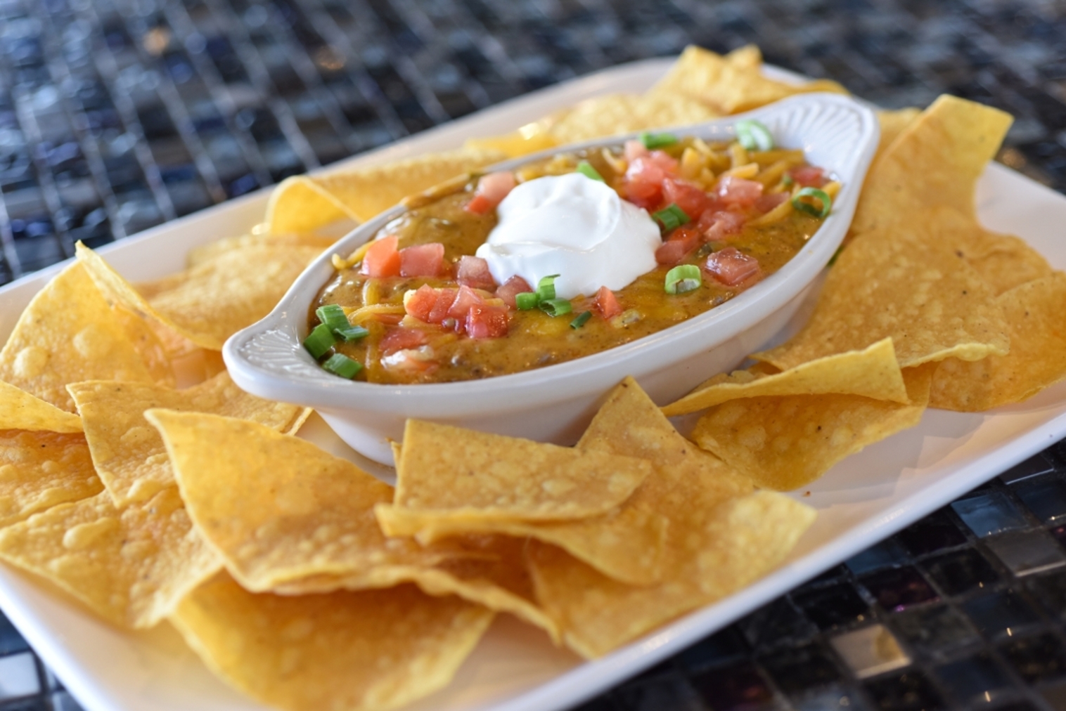 Order QUESO DIP food online from Hops N Drops store, Bonney Lake on bringmethat.com
