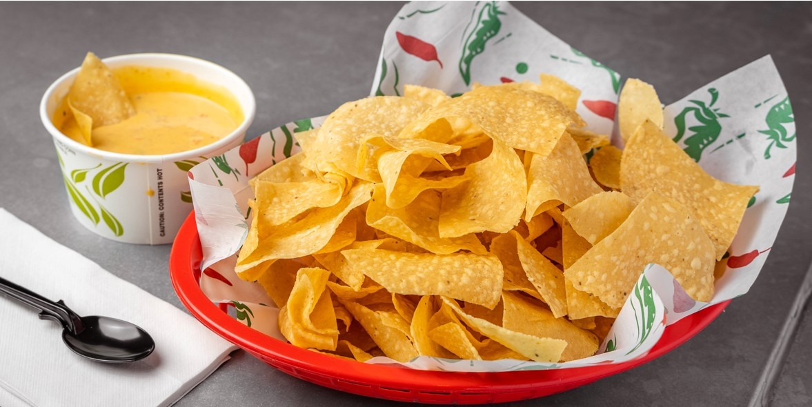 Order Dr. J's Chips & Queso food online from The Taco Joint store, Dallas on bringmethat.com