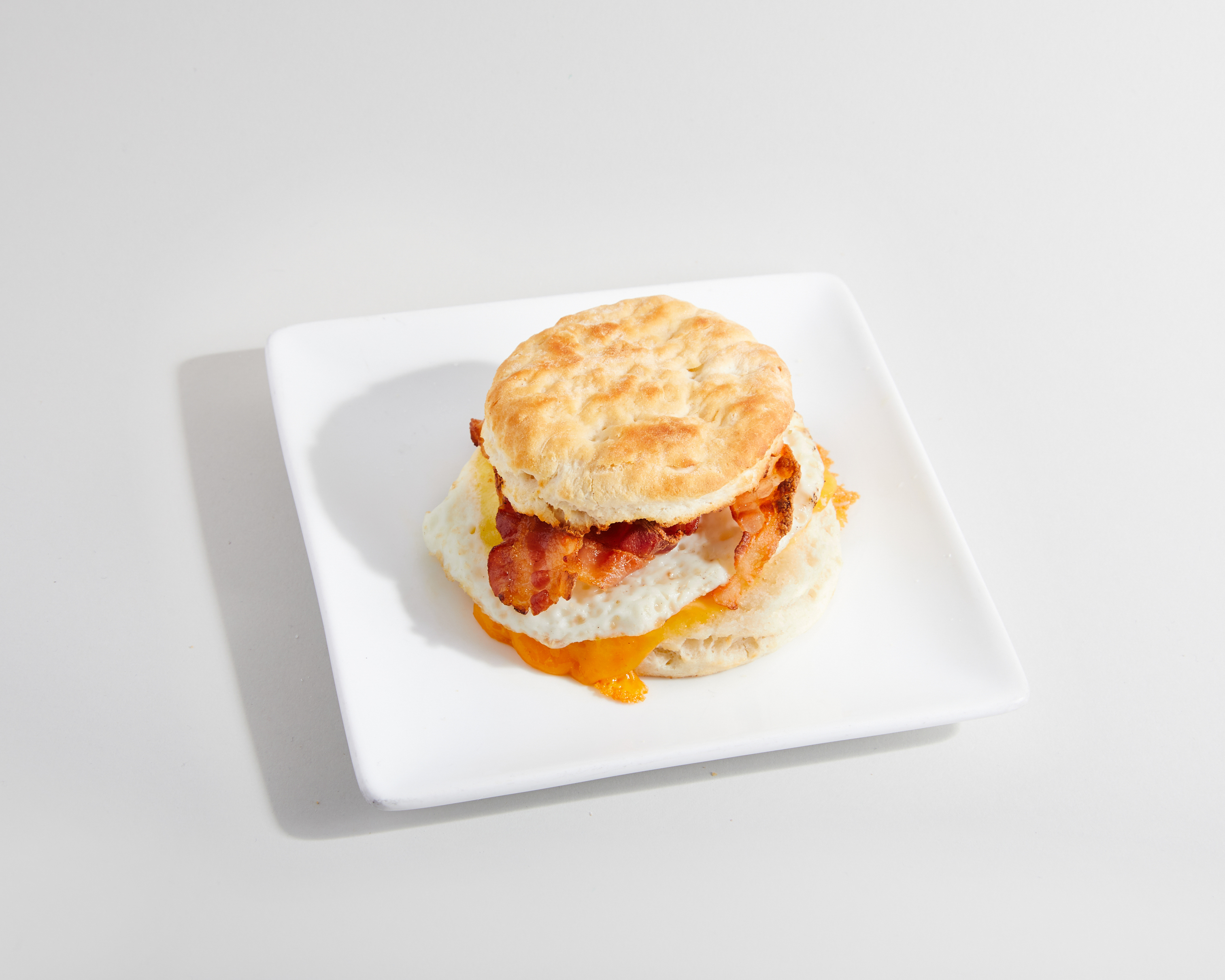 Order Biscuit sandwich - bacon, egg & cheese food online from Sweetwaters Coffee & Tea store, Scottsdale on bringmethat.com