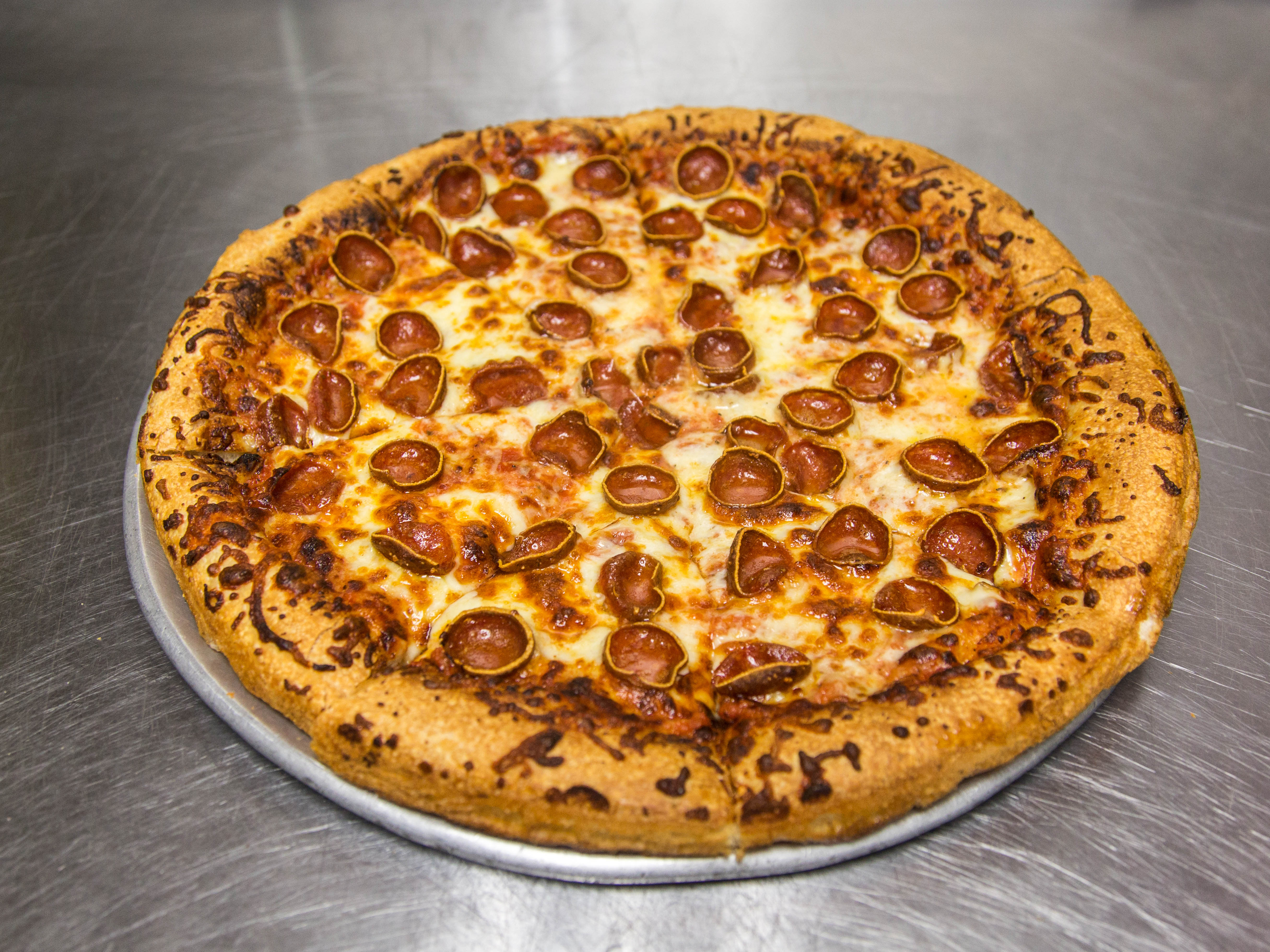 Order 1 Topping Pizza food online from Little John's Pizza store, Warwick on bringmethat.com