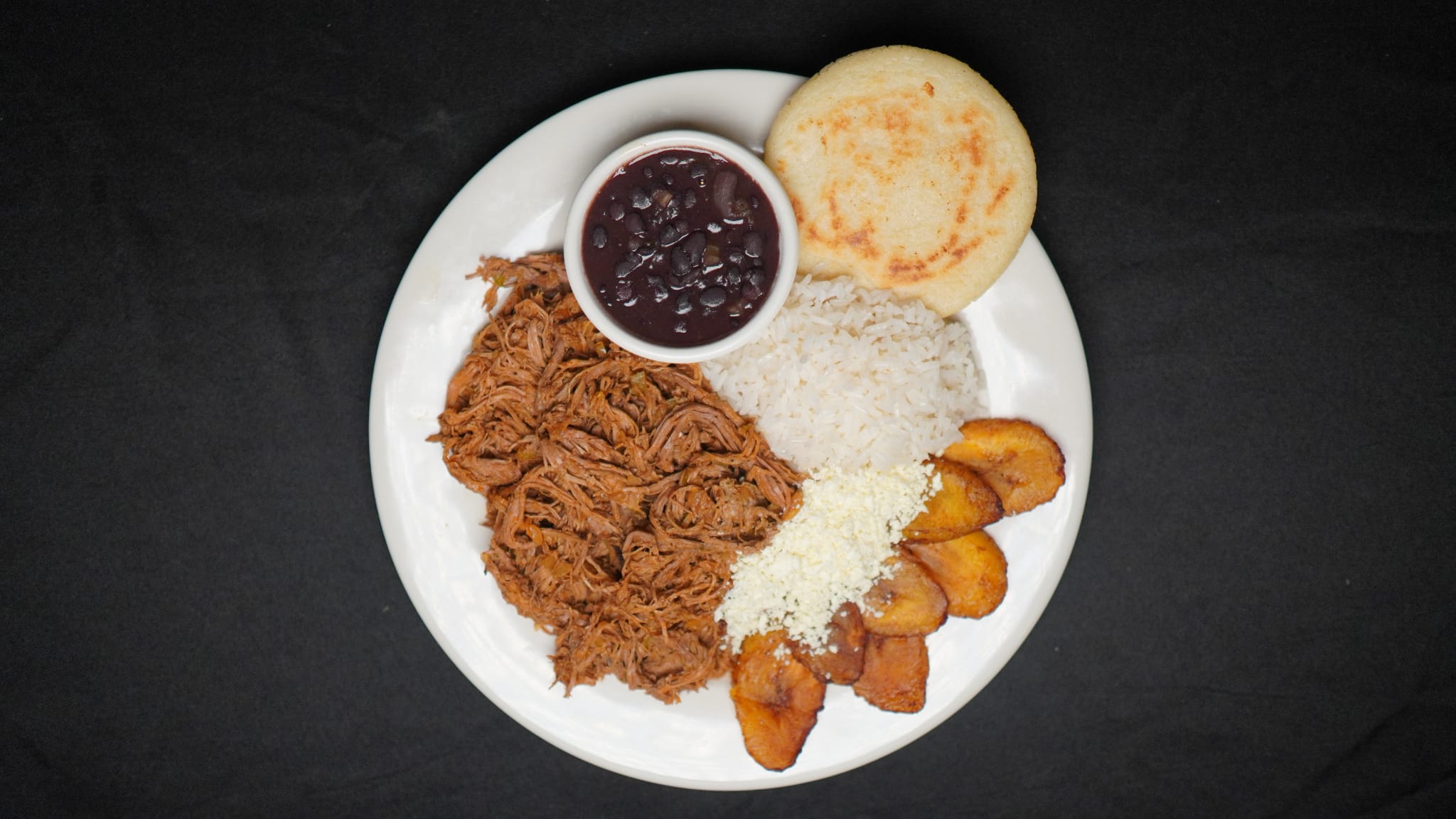 Order Pabellon Criollo food online from Arepera guacuco restaurant store, Brooklyn on bringmethat.com