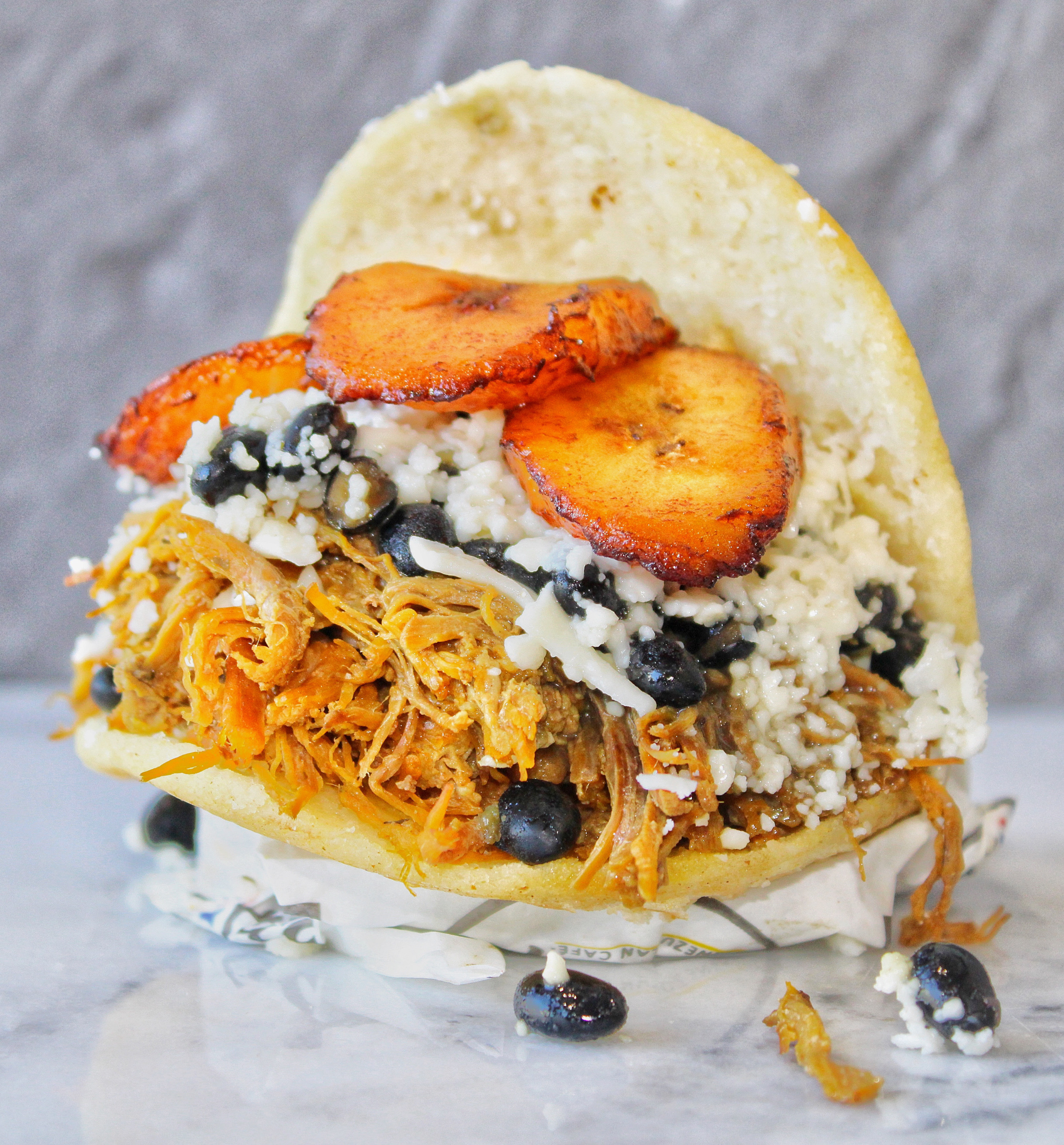 Order Pabellon Arepa food online from Rica Arepa Venezuelan Cafe store, Chicago on bringmethat.com