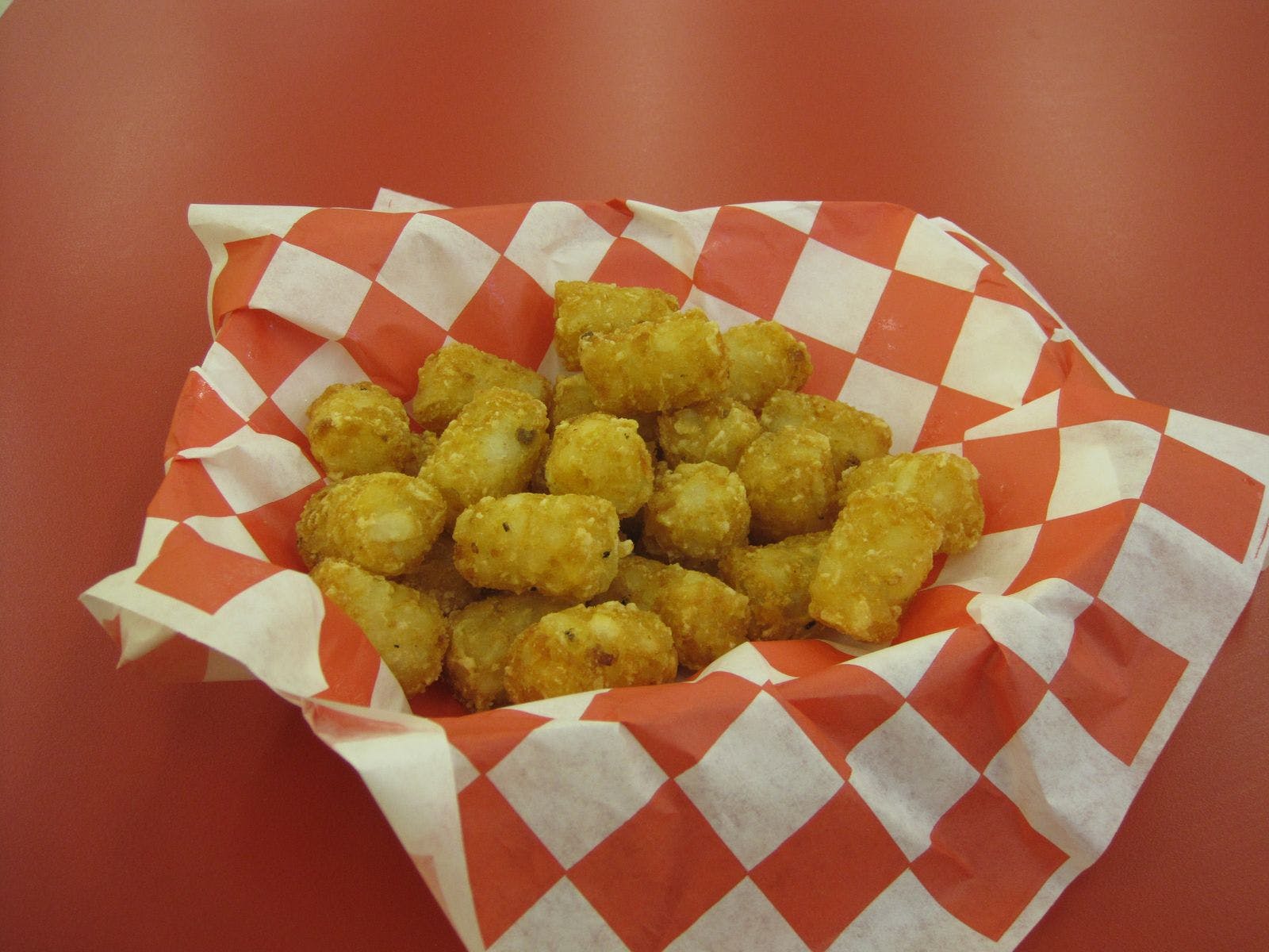 Order Tater Tot Bites - Appetizer food online from Rocky's Pizzeria & Ice Cream store, North Chicago on bringmethat.com