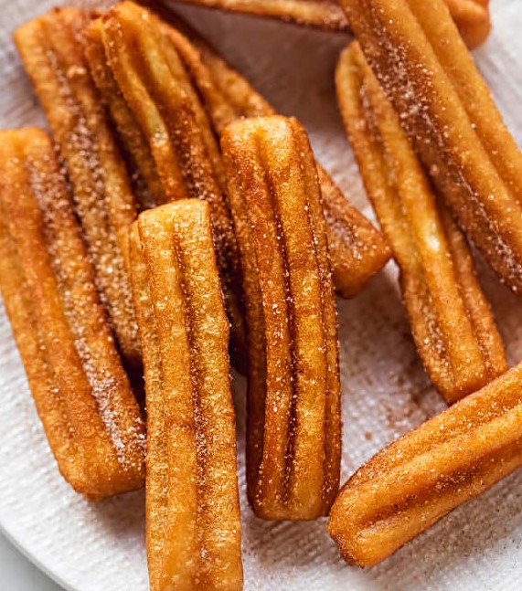 Order 2 Churros With Cinnamon & Sugar food online from Chicken Road store, Bellmore on bringmethat.com