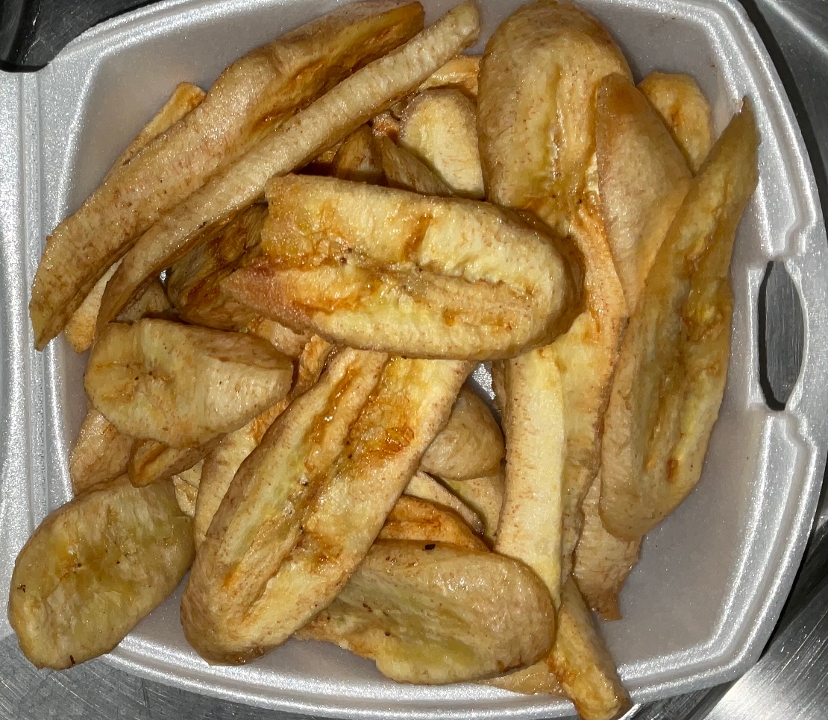Order Tajadas - Green plantain chips food online from Don Quijote Restaurant store, Manchester on bringmethat.com