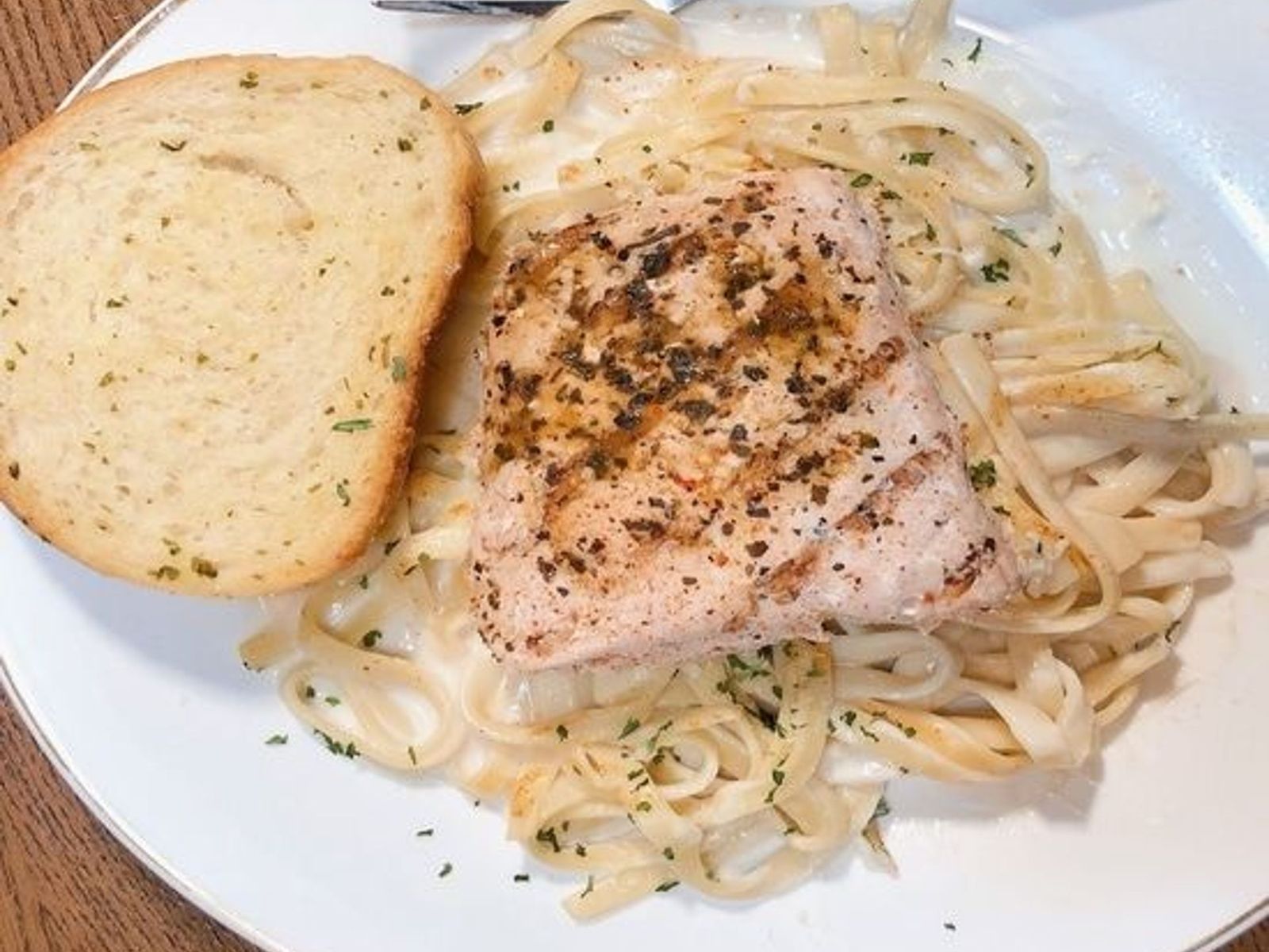 Order Salmon Pasta food online from Juicy Seafood store, Clarksville on bringmethat.com