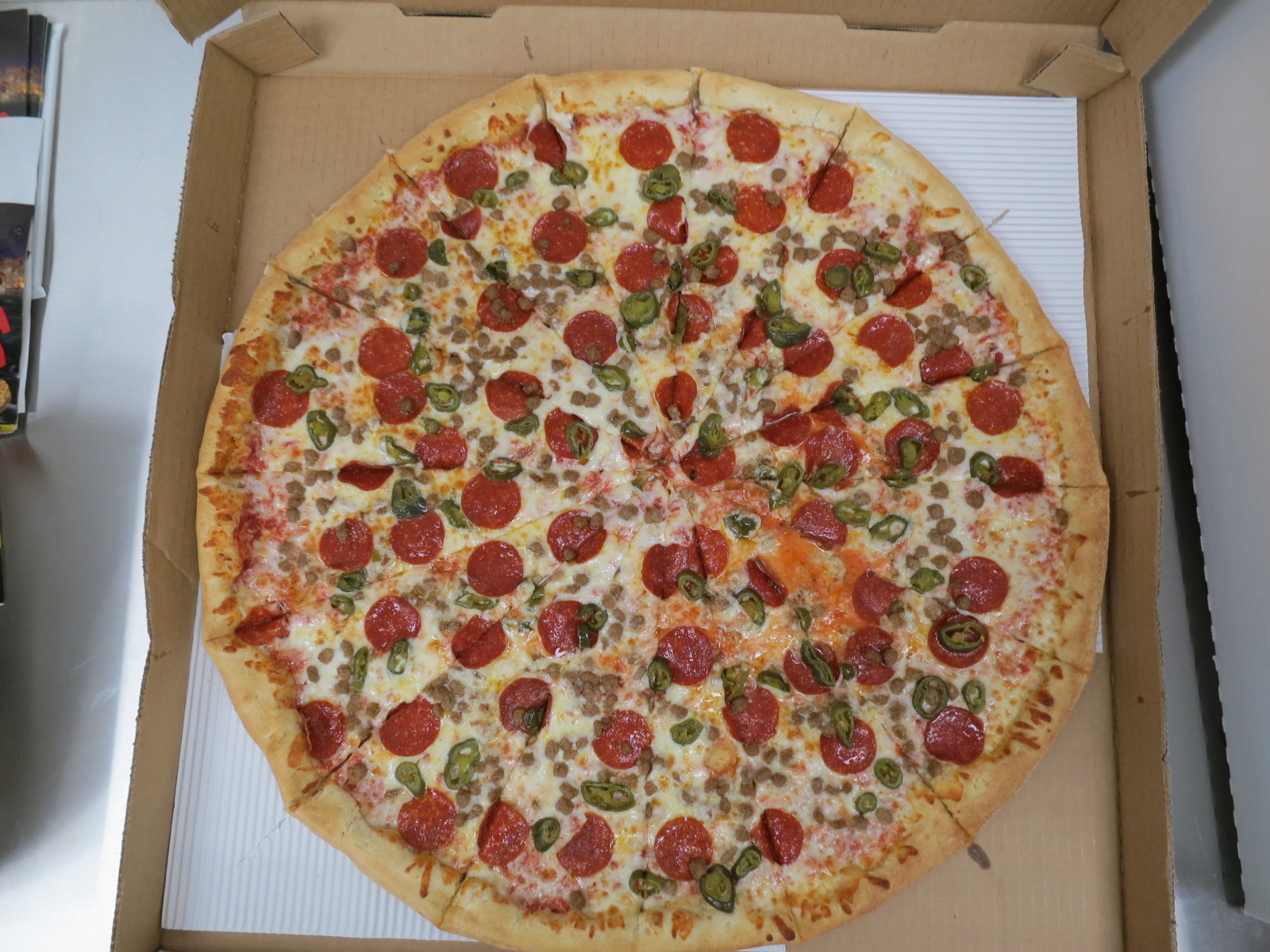 Order 2 LG (14") Pizza 1 topping and Cheezy Bread food online from Mega Pizza store, Raleigh on bringmethat.com
