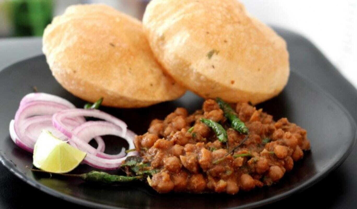Order Poori Channa food online from Peacock Indian Cuisine store, Plano on bringmethat.com