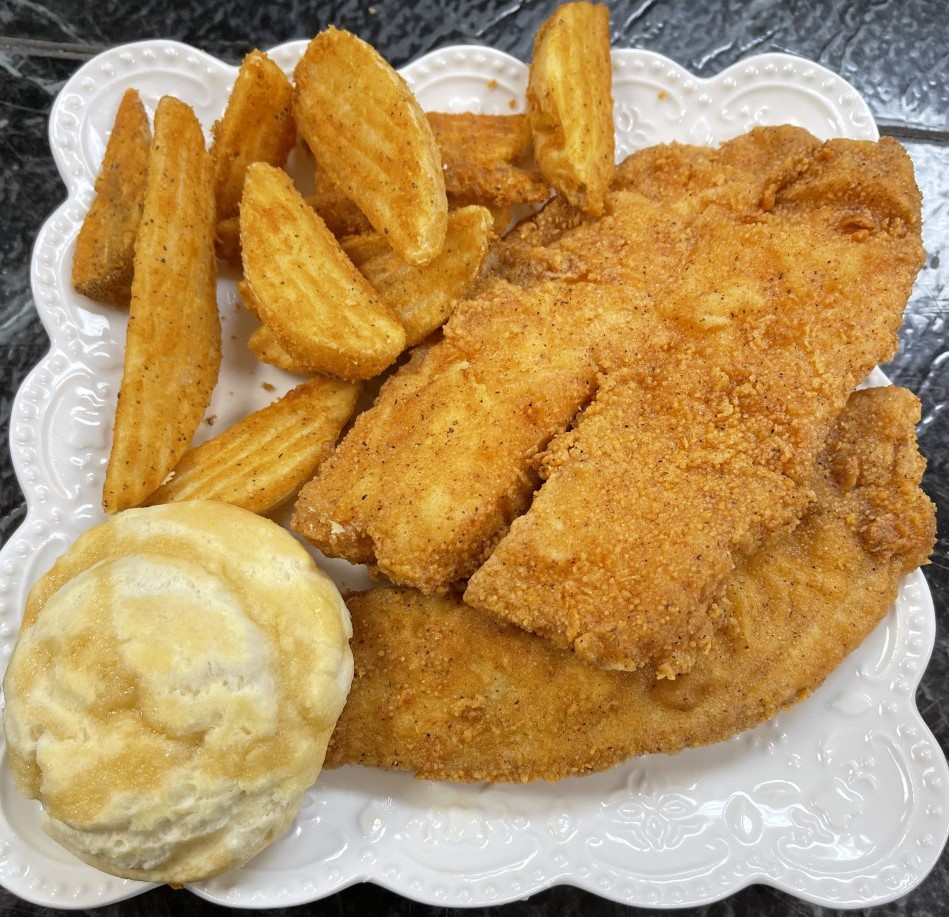 Order 5pc Fried Cajun Fish food online from Krispy Krunchy Chicken store, Carbondale on bringmethat.com