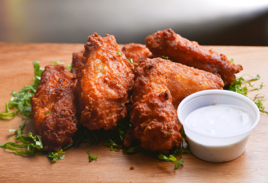 Order Spicy Chicken Wings (8 pc) food online from Afro Deli store, Minneapolis on bringmethat.com