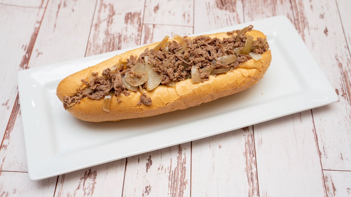 Order 1. Traditional Philly Cheesesteak  Sandwich food online from Cheesesteak grille store, Roseville on bringmethat.com