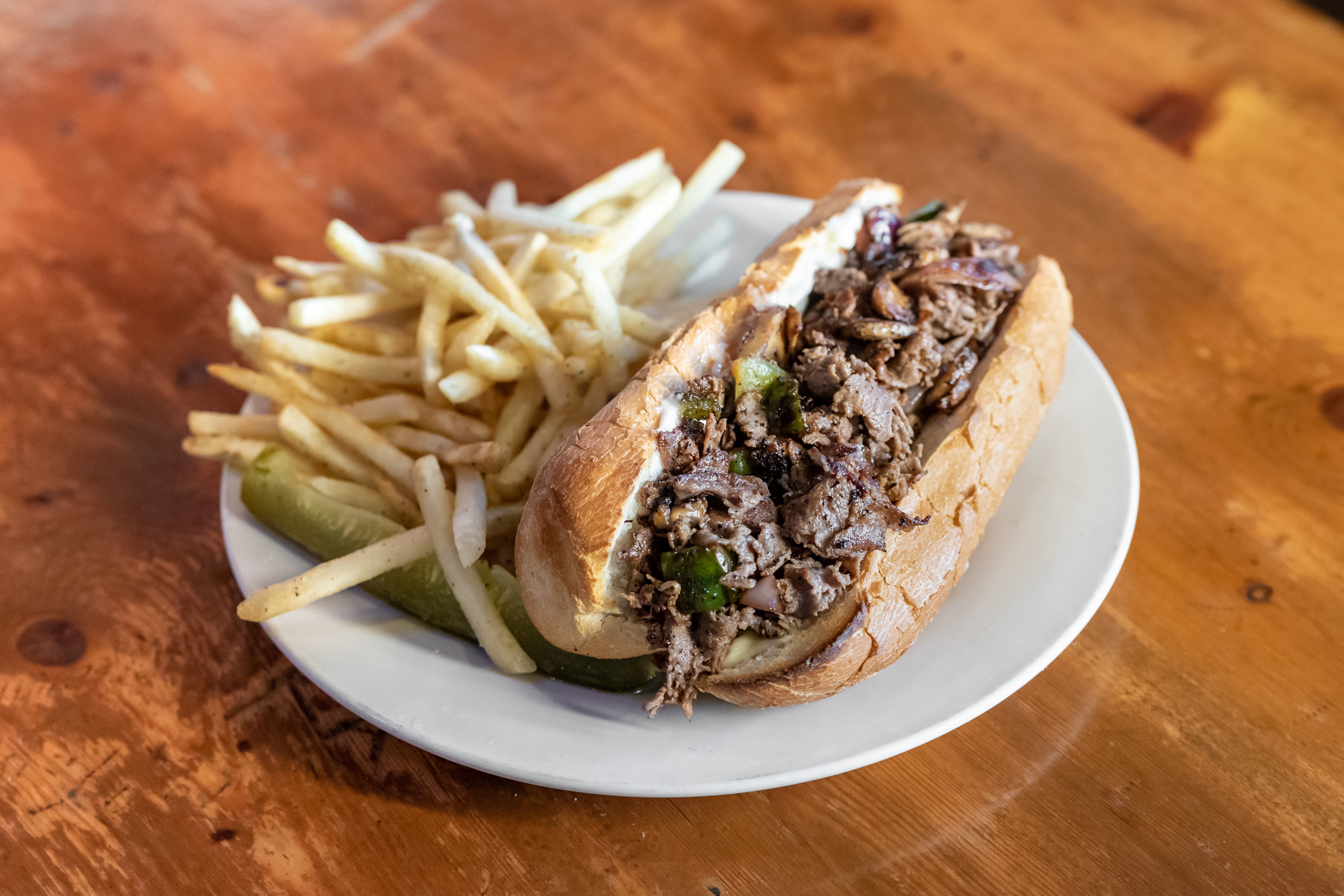 Order Steak & Cheese Sub with Grilled Mushrooms, Peppers & Onions - 8'' food online from George's Pizza store, High Point on bringmethat.com