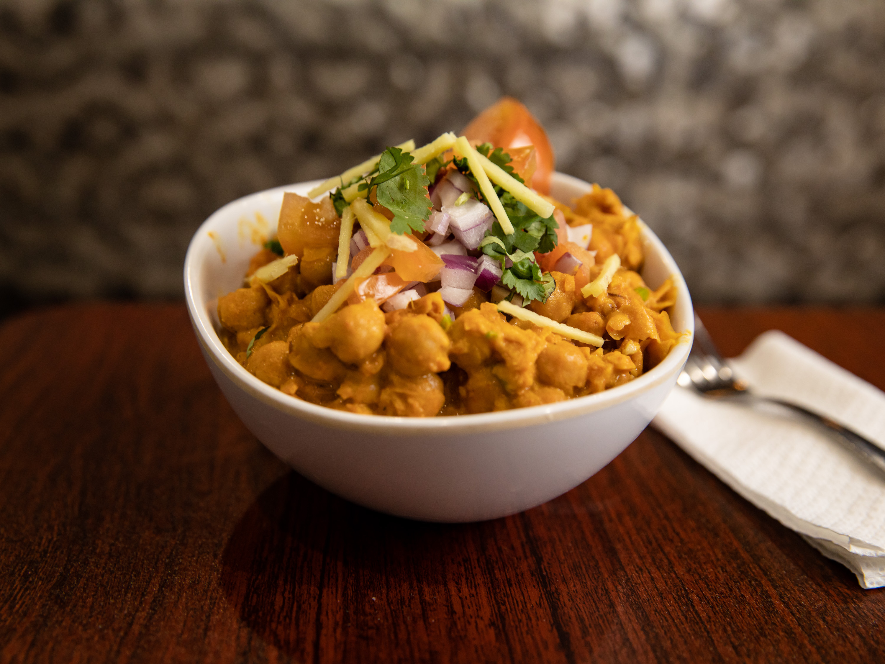Order Chana Masala food online from Astoria Indian Restaurant store, Omaha on bringmethat.com