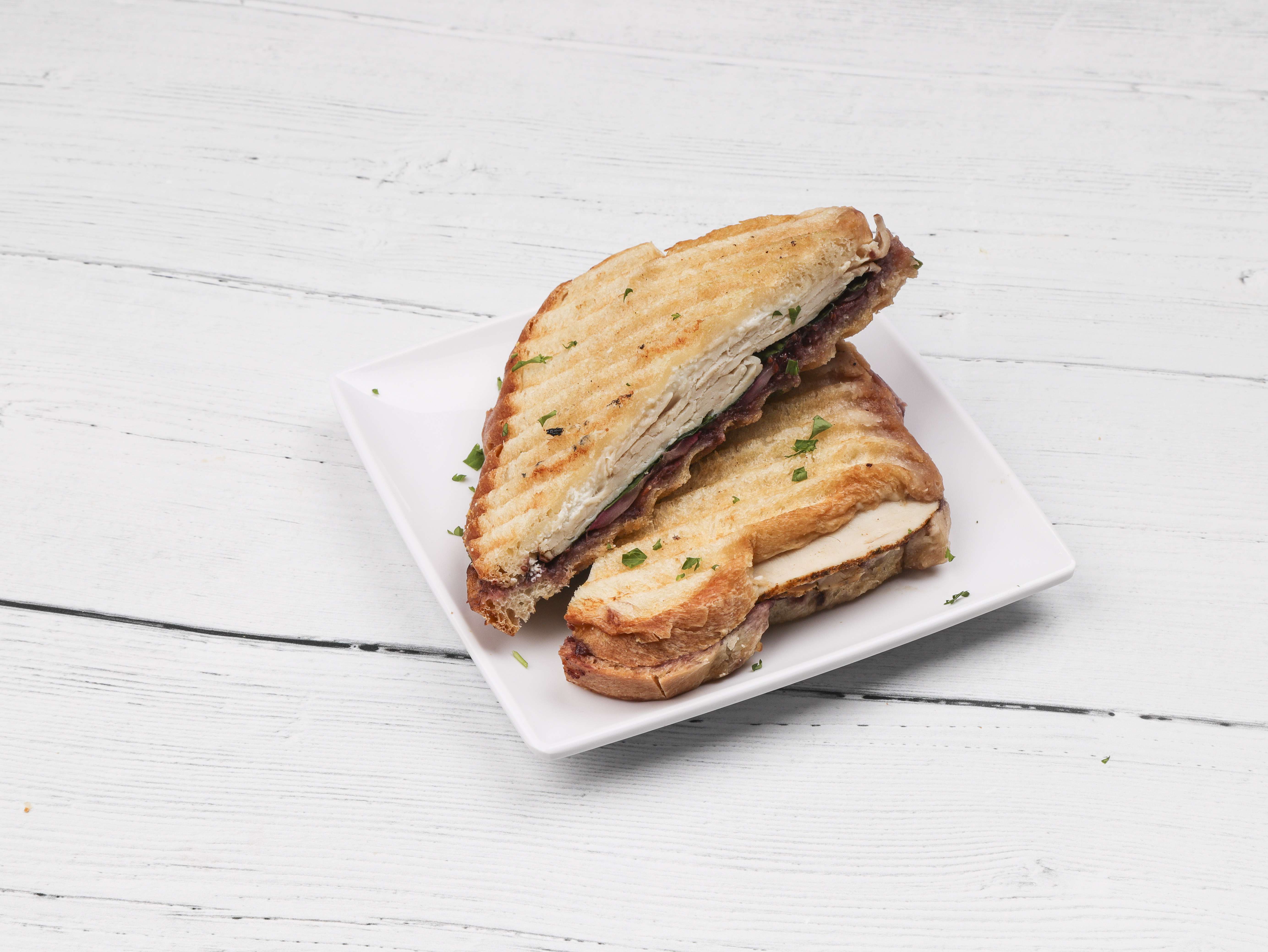 Order Turkey Goat Cheese Panini food online from Sip Coffee store, Toledo on bringmethat.com