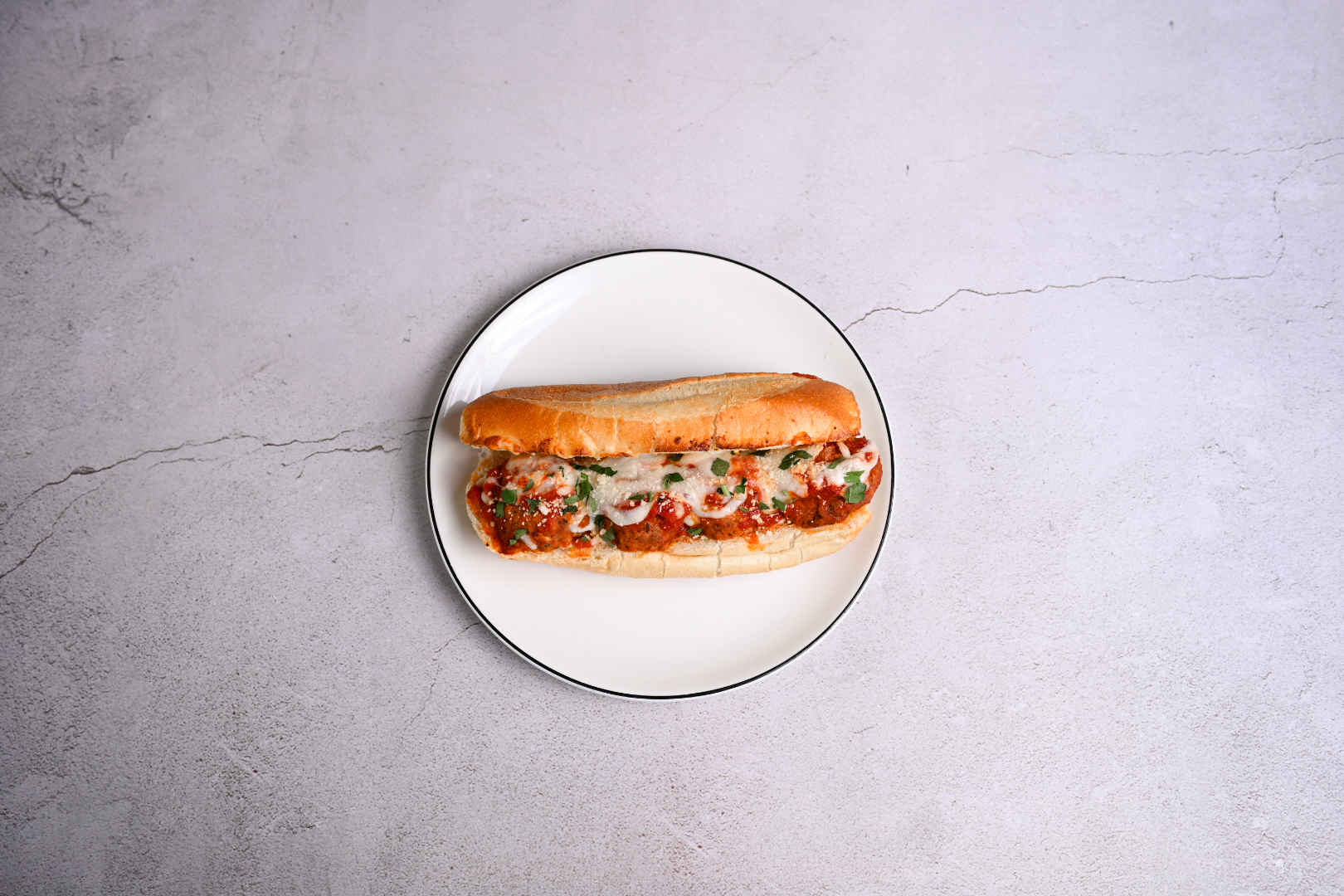 Order Meatball Parmigiana Panini food online from Maria's Italian Kitchen store, Brentwood on bringmethat.com