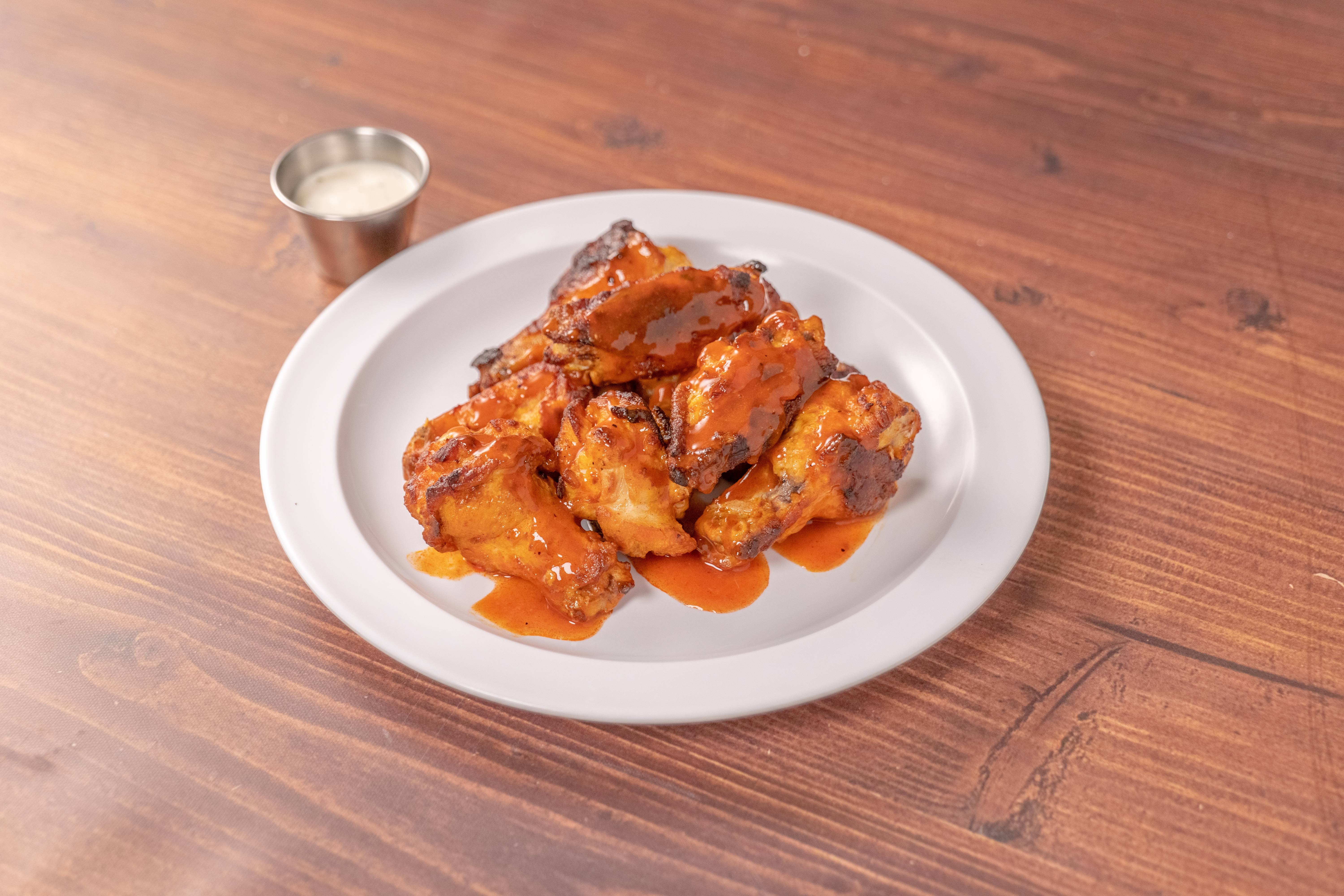 Order 10 Piece Buffalo Wing food online from JC's Famous Pizza store, Reseda on bringmethat.com
