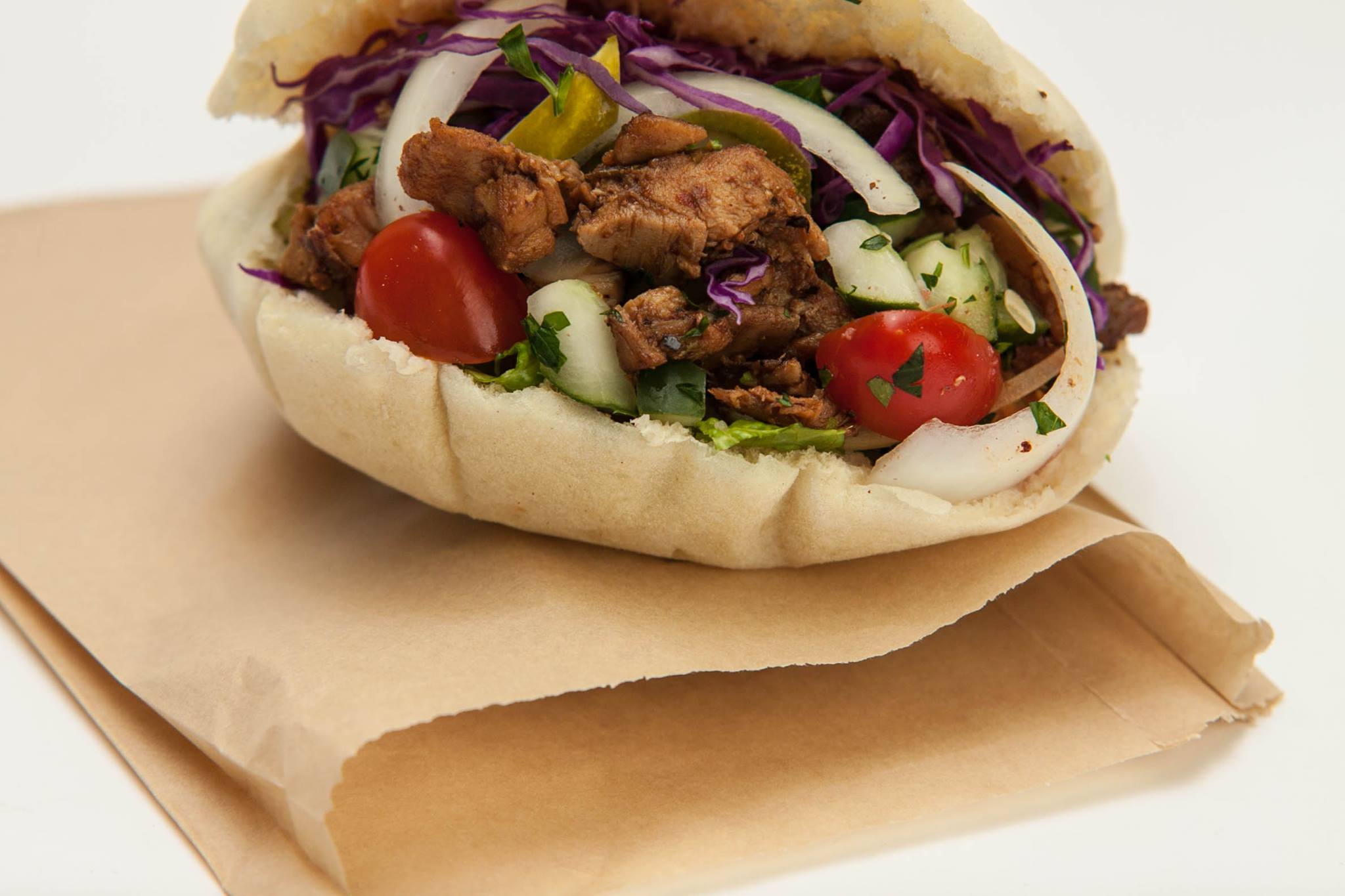 Order Spicy Chicken Pita food online from Mezza Grill store, Chicago on bringmethat.com