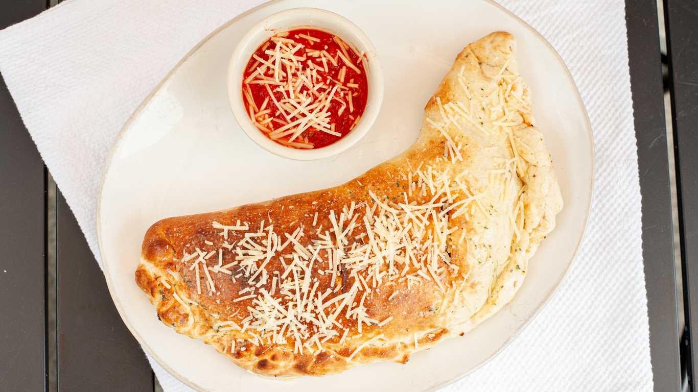 Order Large Combination Calzone food online from Countryside Pizza & Grill store, Eugene on bringmethat.com