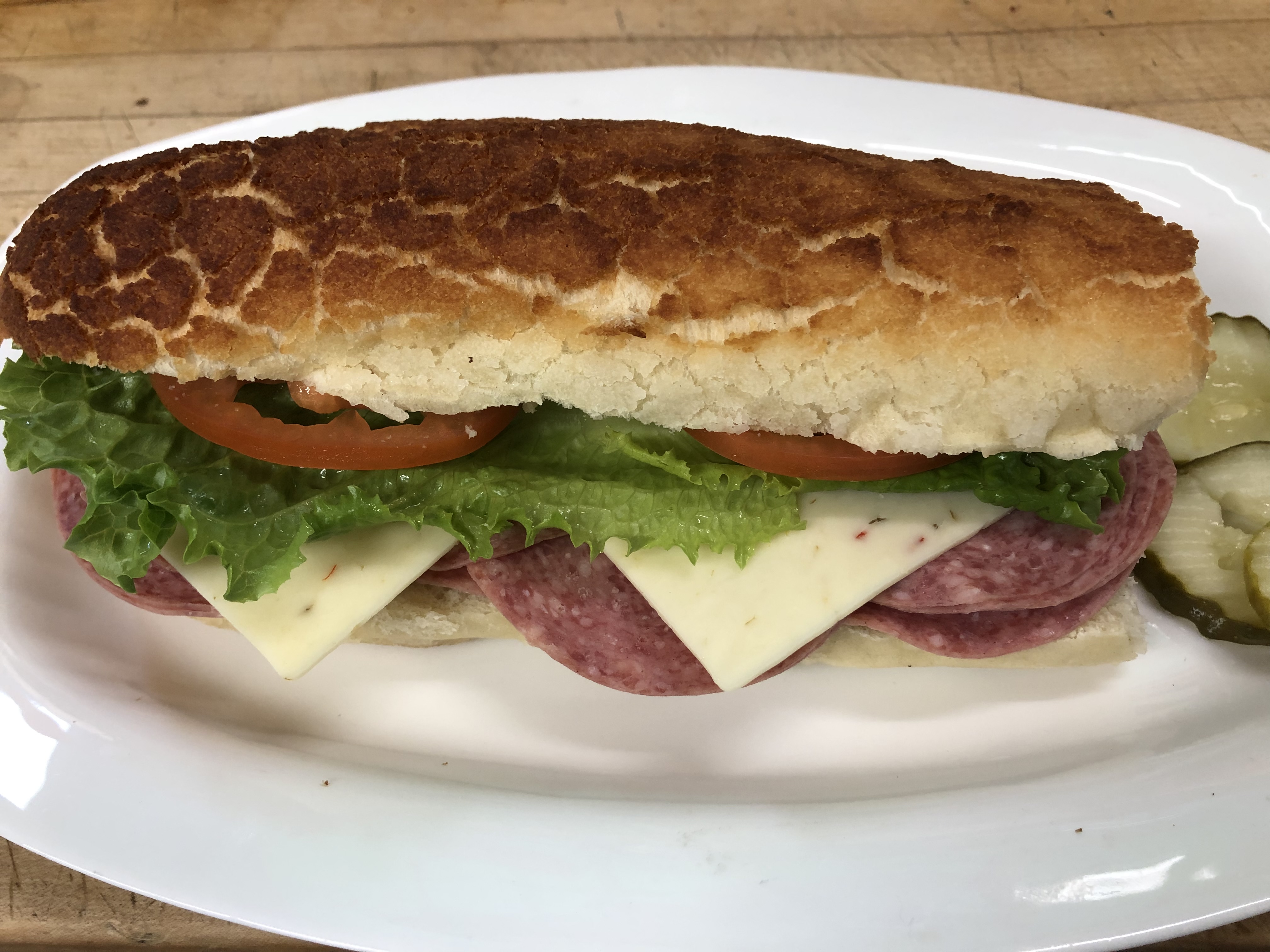 Order Genoa Salami Sandwich food online from Lucca Deli store, San Francisco on bringmethat.com