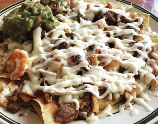 Order Nachos Supreme w/ 3 meats food online from Picante Picante store, Bronx on bringmethat.com