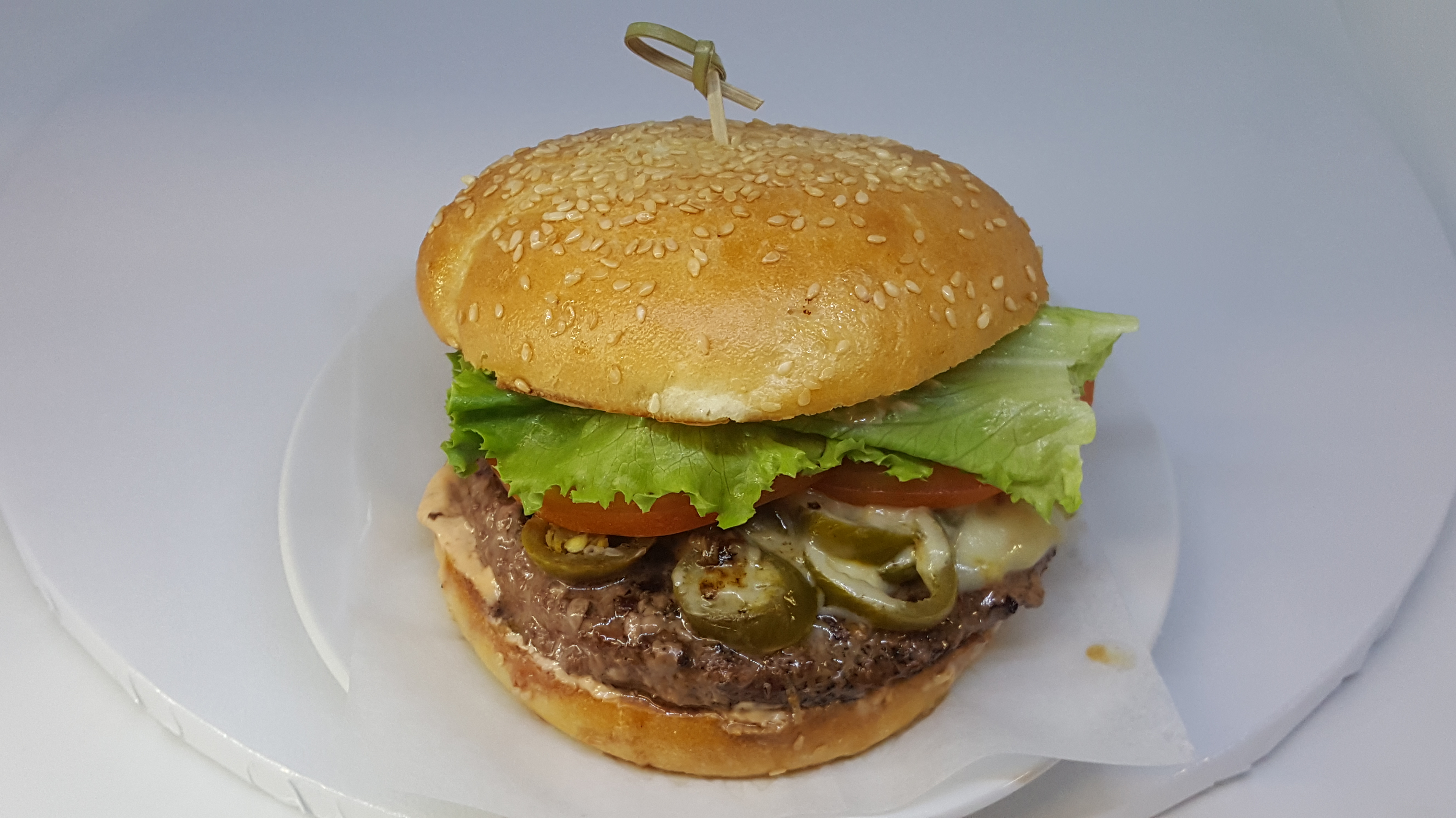 Order Spicy Houston Burger food online from La Bakery store, Carson City on bringmethat.com