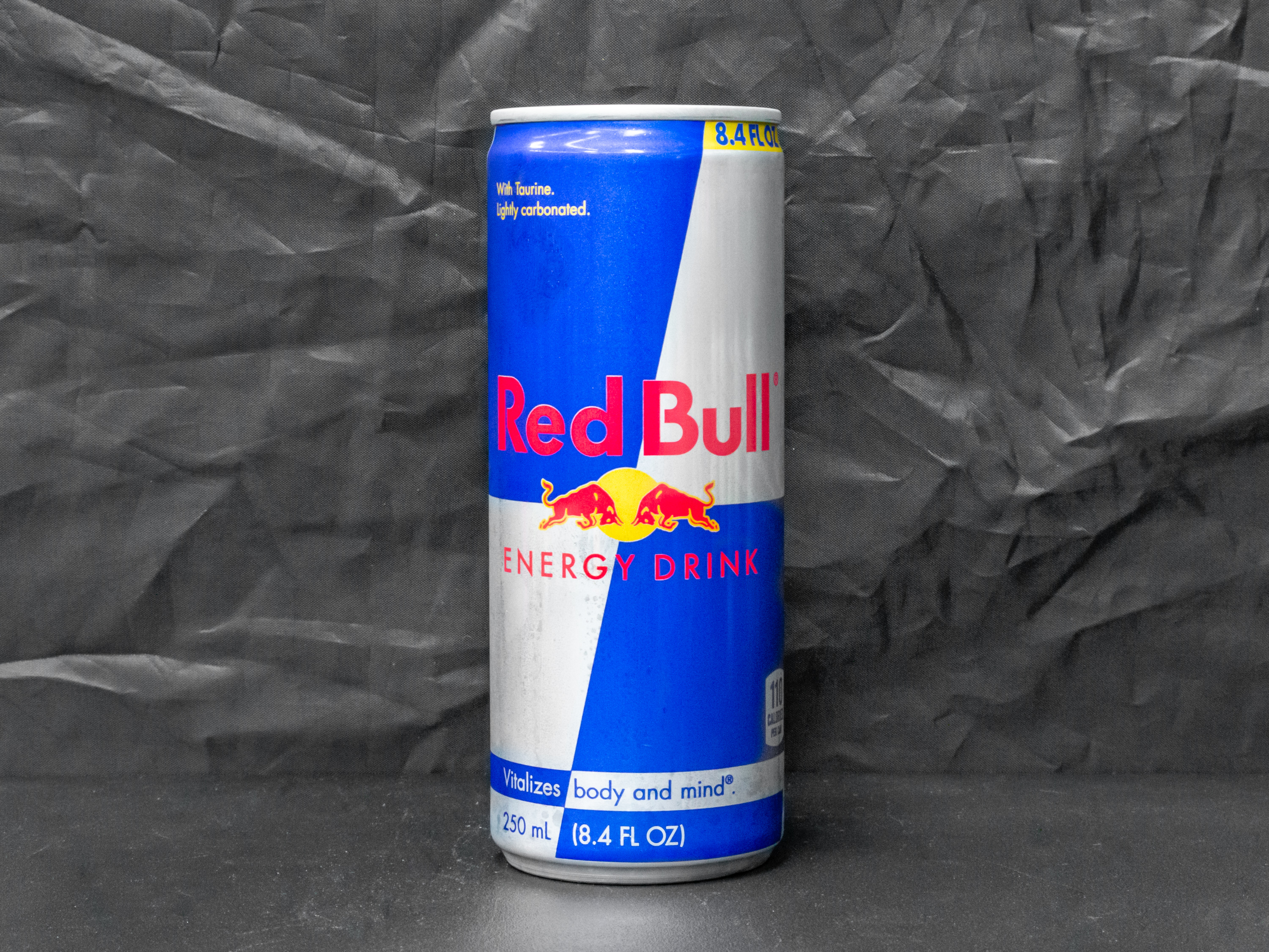 Order Red Bull, 12 oz. Mixer food online from Logan Liquor store, Chicago on bringmethat.com