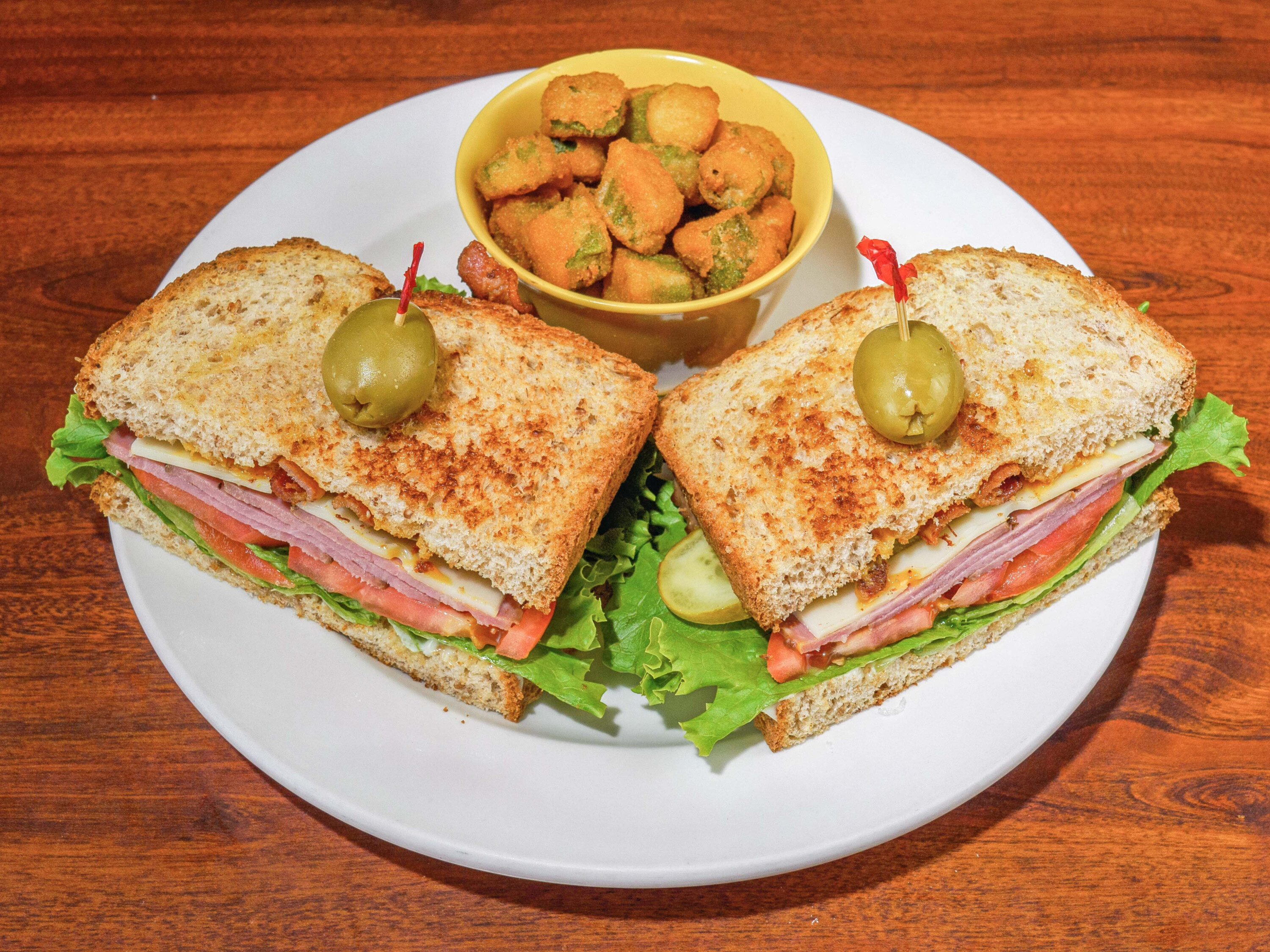 Order Bistro Club Sandwich food online from Bacon's Bistro and Cafe store, Hurst on bringmethat.com