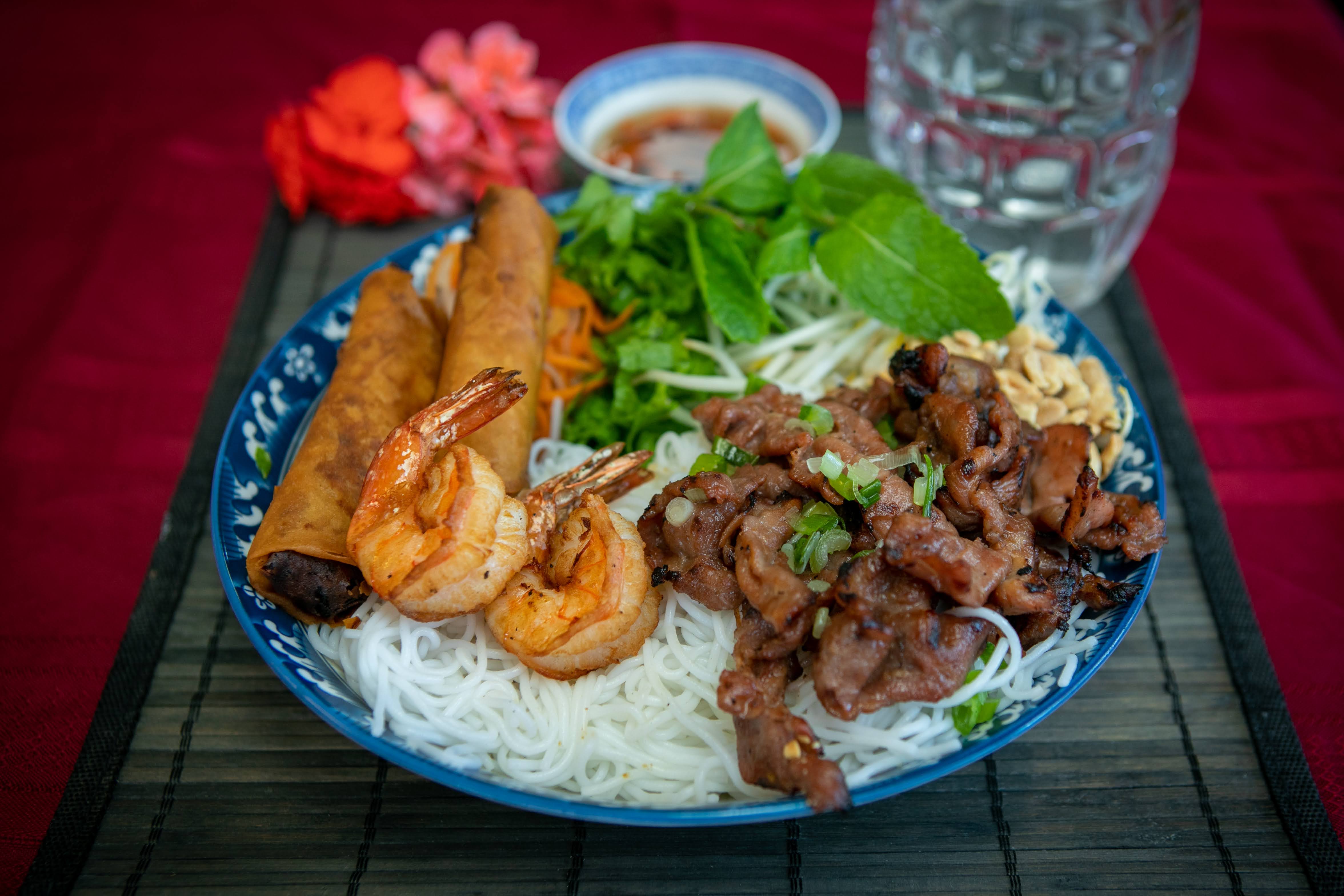Order 31. Grilled Pork, Shrimp and Egg Rolls Vermicelli food online from Le Paradis store, hayward on bringmethat.com