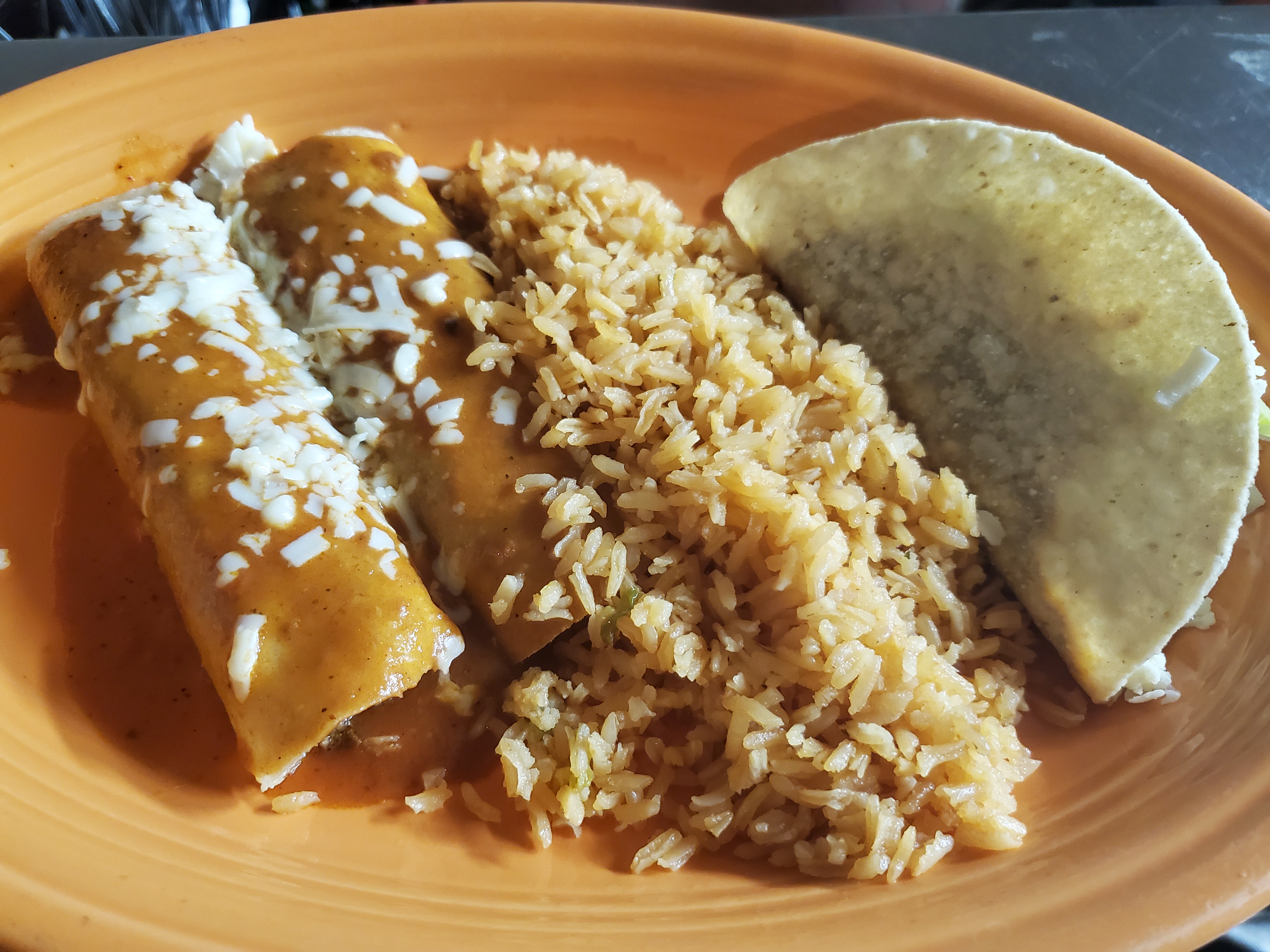 Order 1. Taco, 2 Beef Enchiladas, Rice food online from Los Gallos Mexican Grill store, Rochester on bringmethat.com