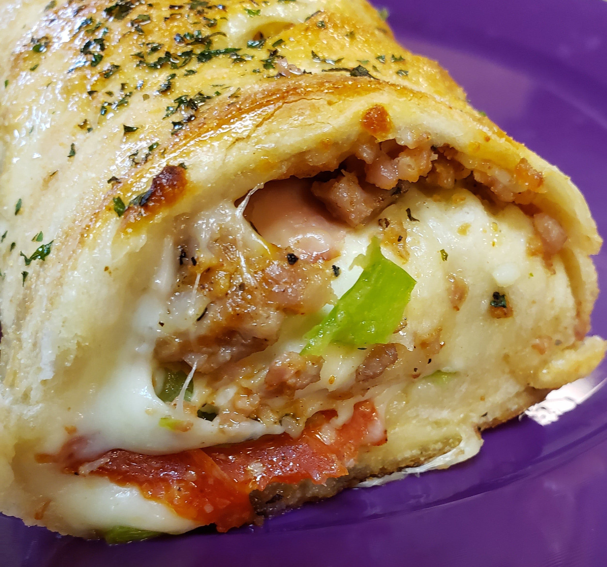 Order Stromboli with Three Toppings - Full 2 Foot food online from Camellone store, Canton on bringmethat.com