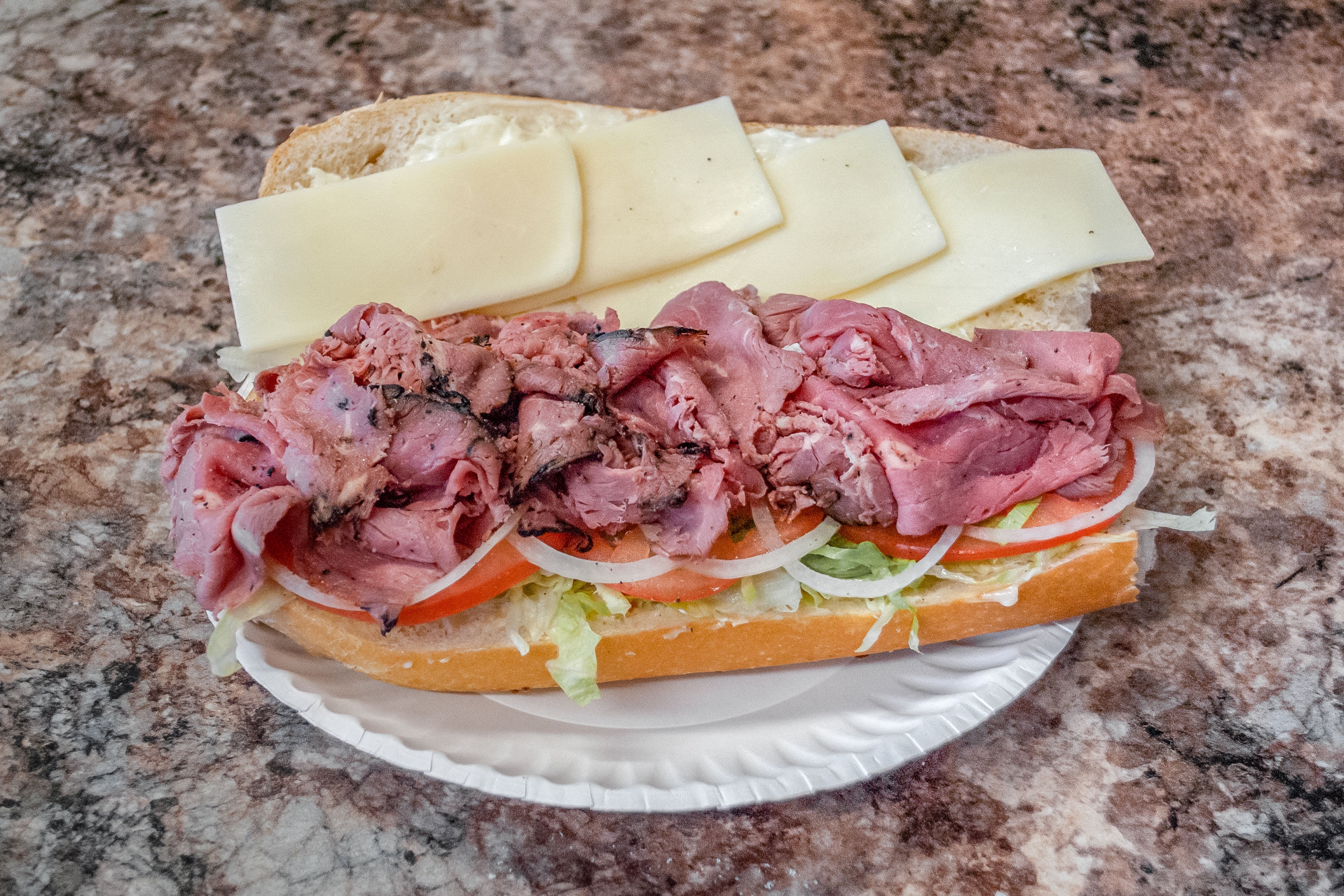 Order Roast Beef Hot Sub - Roast Beef Hot Sub food online from All Star Pizza store, Rochester on bringmethat.com