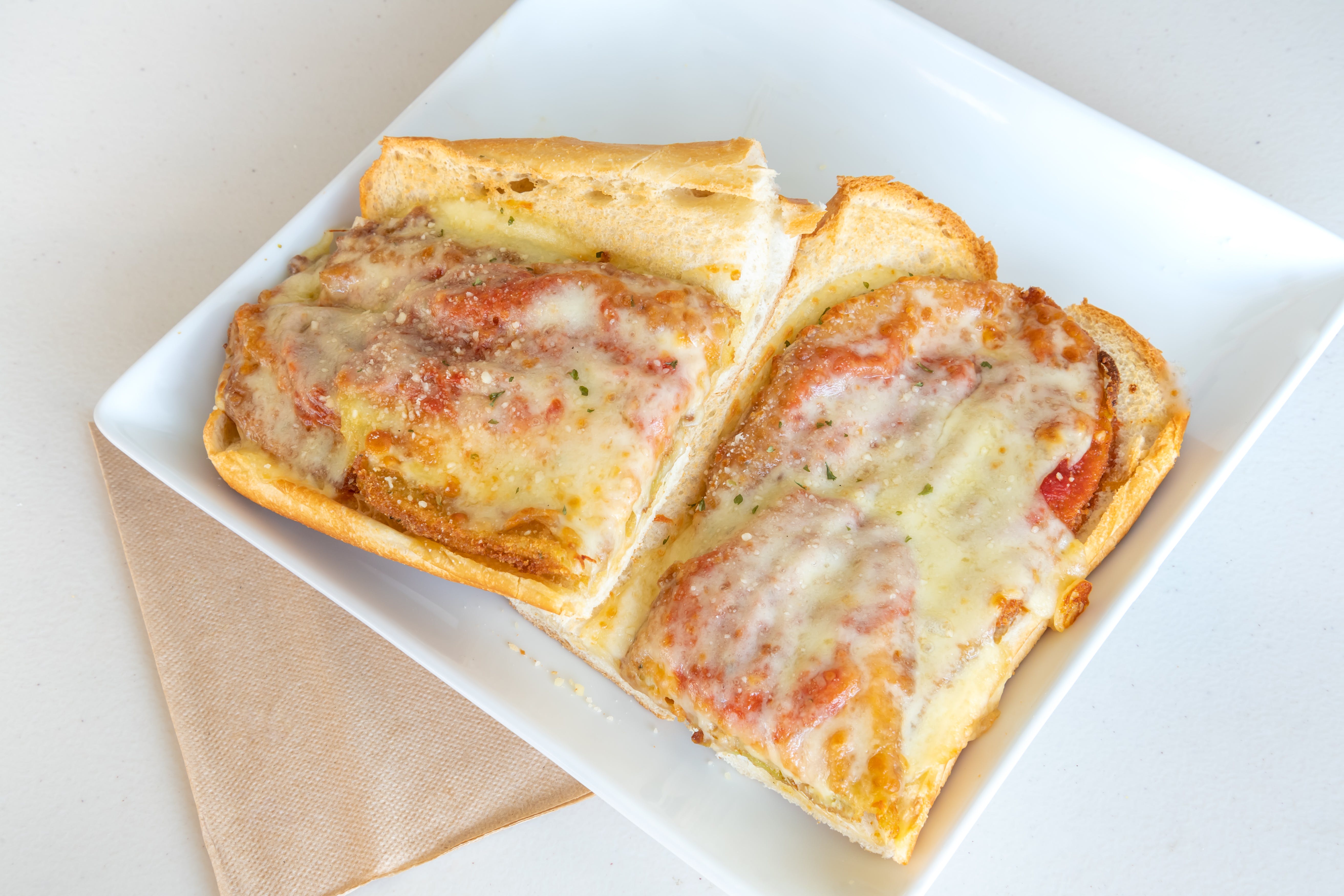 Order Eggplant Parmigiana Sub - 12'' food online from Pizza Machine - Hollywood store, Hollywood on bringmethat.com