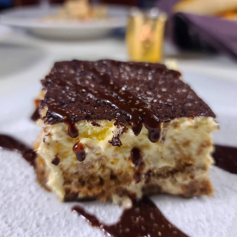 Order Tiramisu - Feeds 1 Person food online from Florio Italian Restaurant & Grille store, Lincoln on bringmethat.com