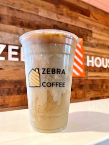 Order Vanilla Creme Cold Brew food online from Zebra House Coffee store, San Clemente on bringmethat.com