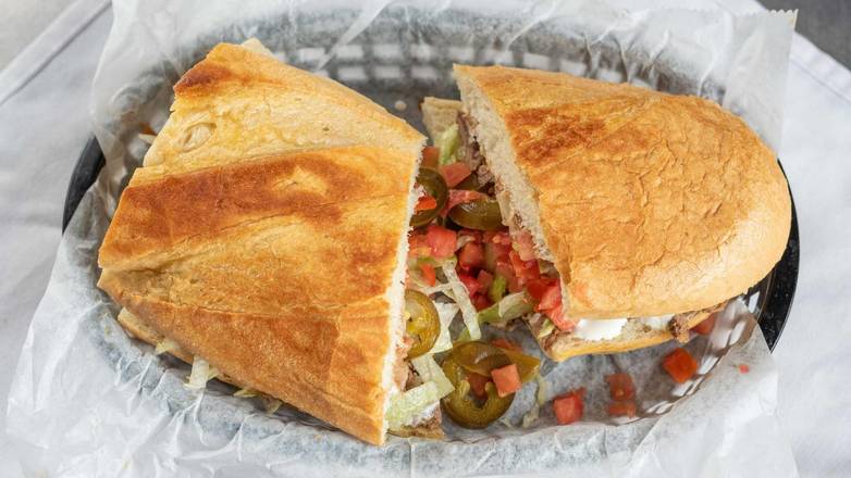 Order Carnitas Torta food online from Cilantro Taqueria store, Shaker Heights on bringmethat.com