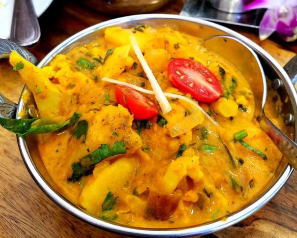 Order Aloo Gobhi Matar food online from Mughlai Indian Cuisine store, New York on bringmethat.com