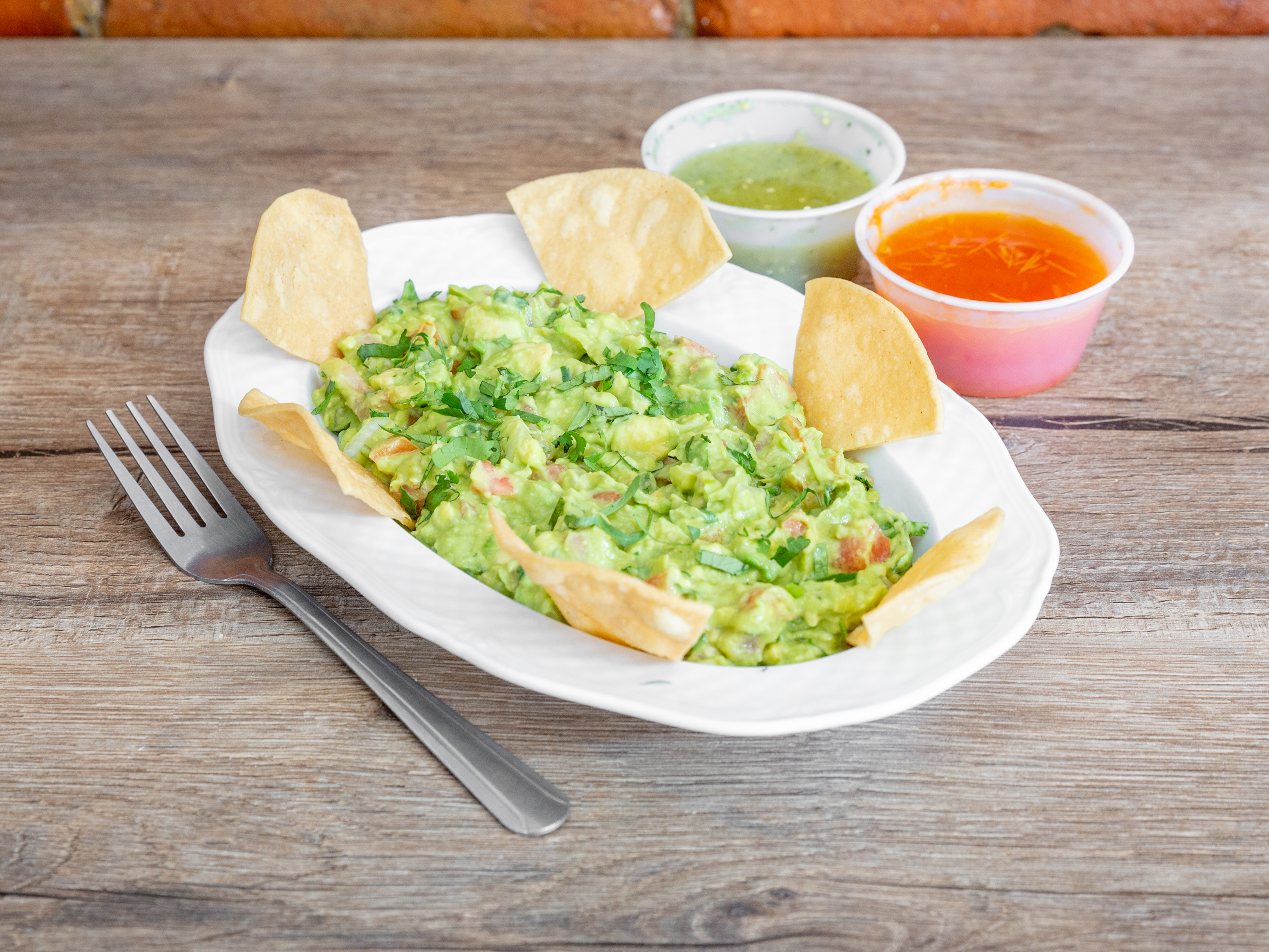 Order Guacamole & Chips food online from Alondra's Cuisine store, Middletown on bringmethat.com