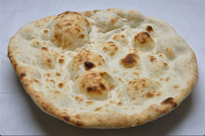 Order Naan food online from India Palace store, Salem on bringmethat.com